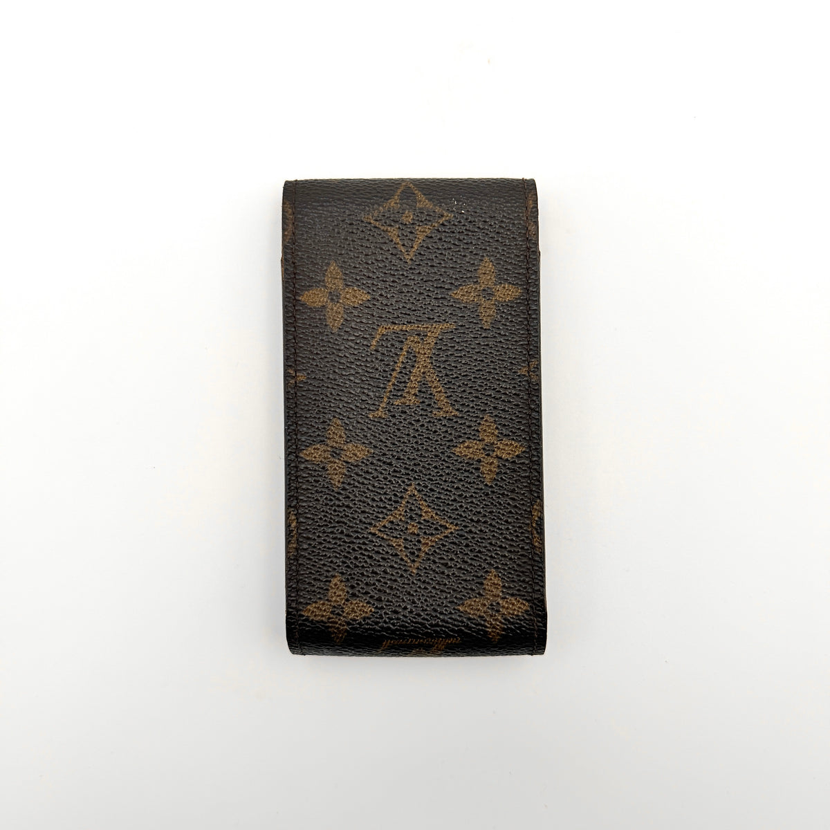 Louis Vuitton monogram brown cigarette case with flap closure on white background