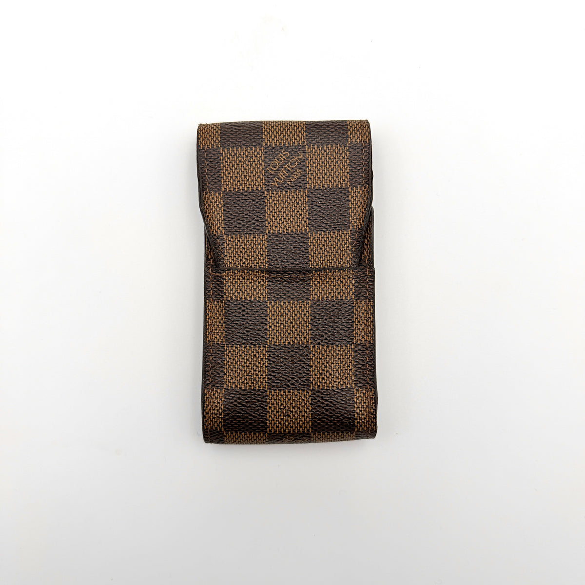 Louis Vuitton Damier brown cigarette case in checked coated canvas with a flap closure, photographed against a white background.
