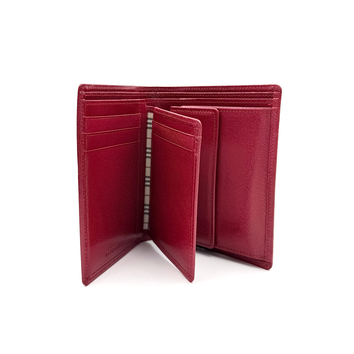 Burberry Nova Check bifold wallet in grained red leather with signature tartan interior, shown closed against a white background