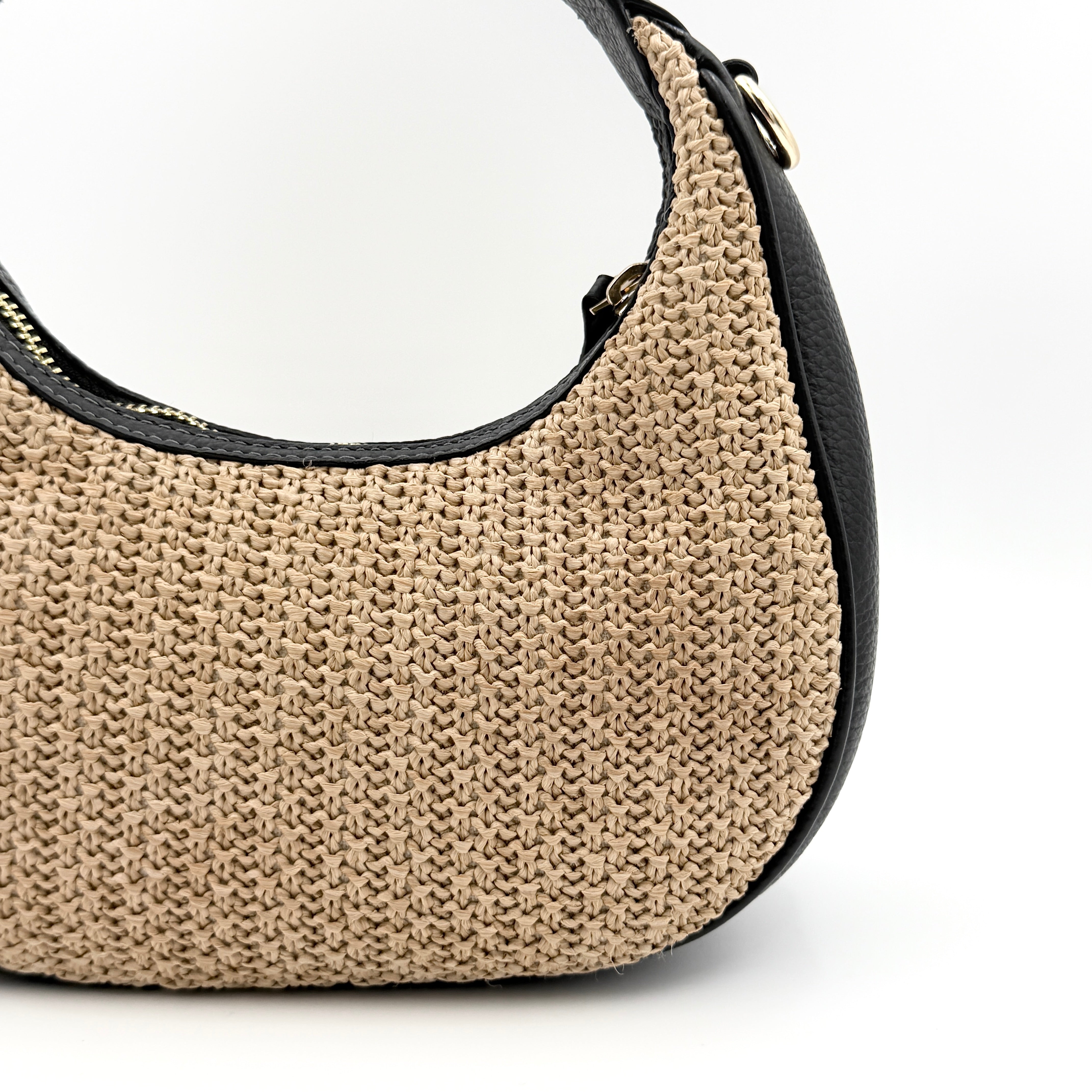 Coach Carmen Mini 2Way Shoulder Bag in beige and black with textured woven body, leather trim, and gold-tone hardware.