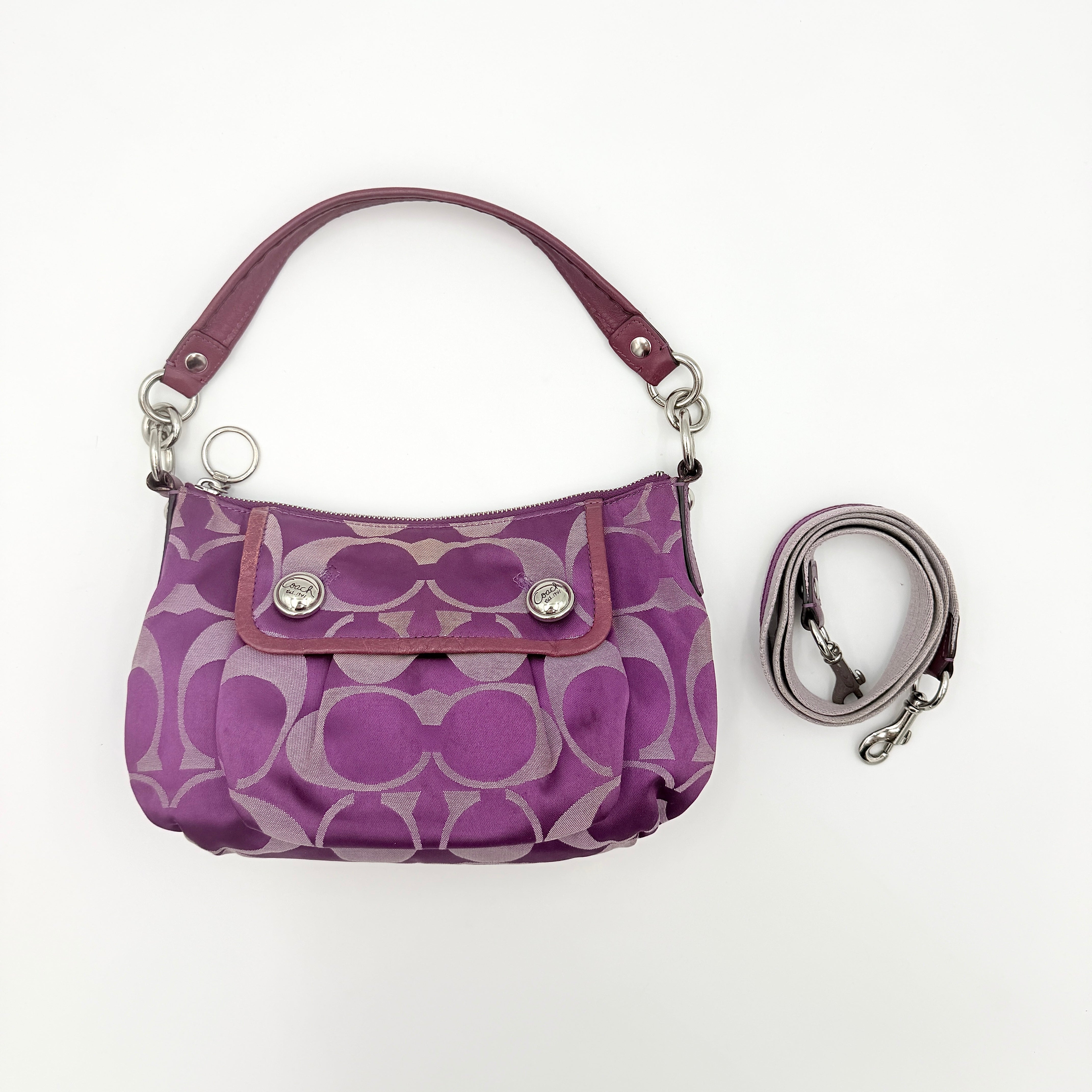 Coach 2Way Signature Shoulder Bag in purple canvas with detachable strap and top handle.