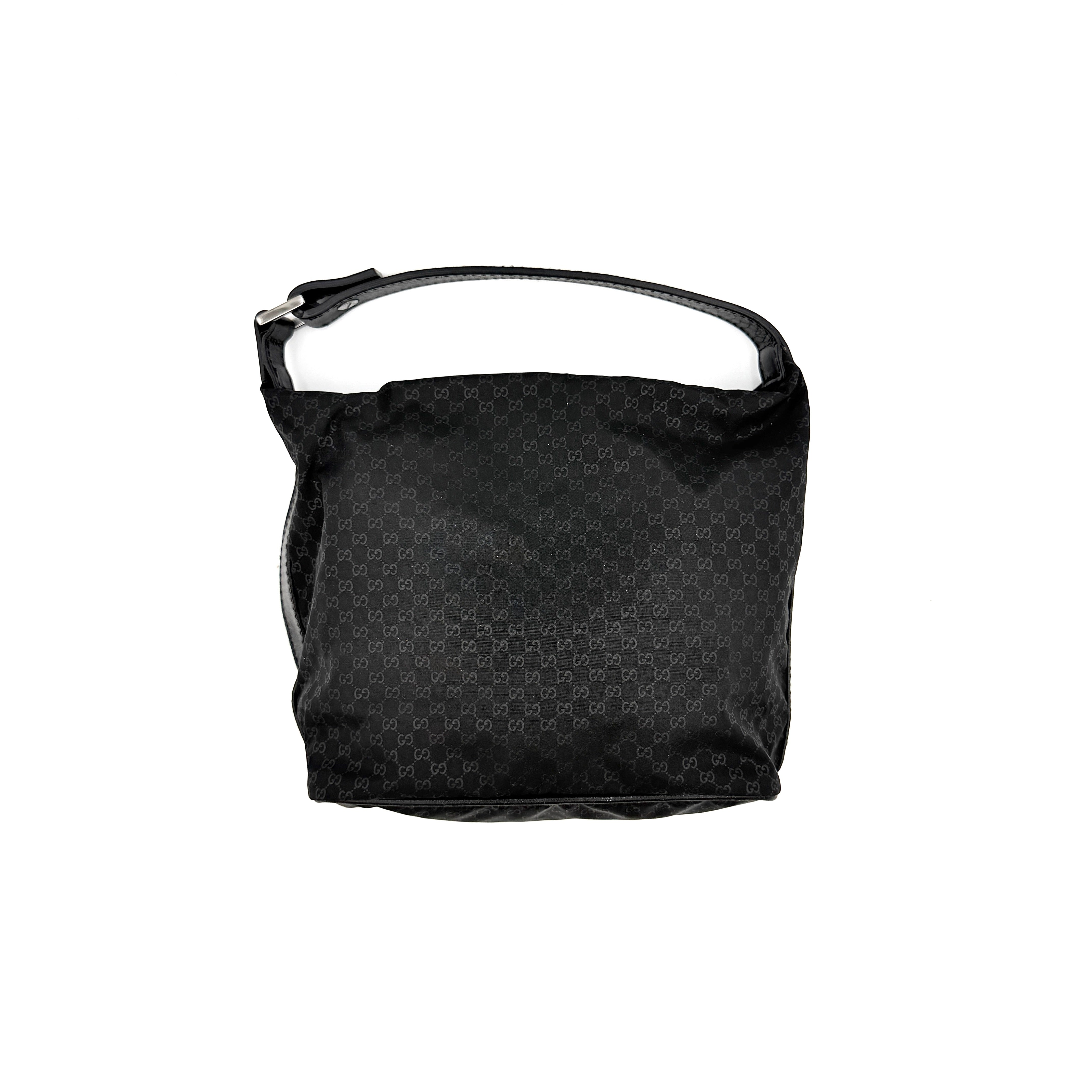 Gucci GG Monogram Mini Hobo black nylon shoulder bag with leather trim and silver-tone hardware, displayed on a plain background.