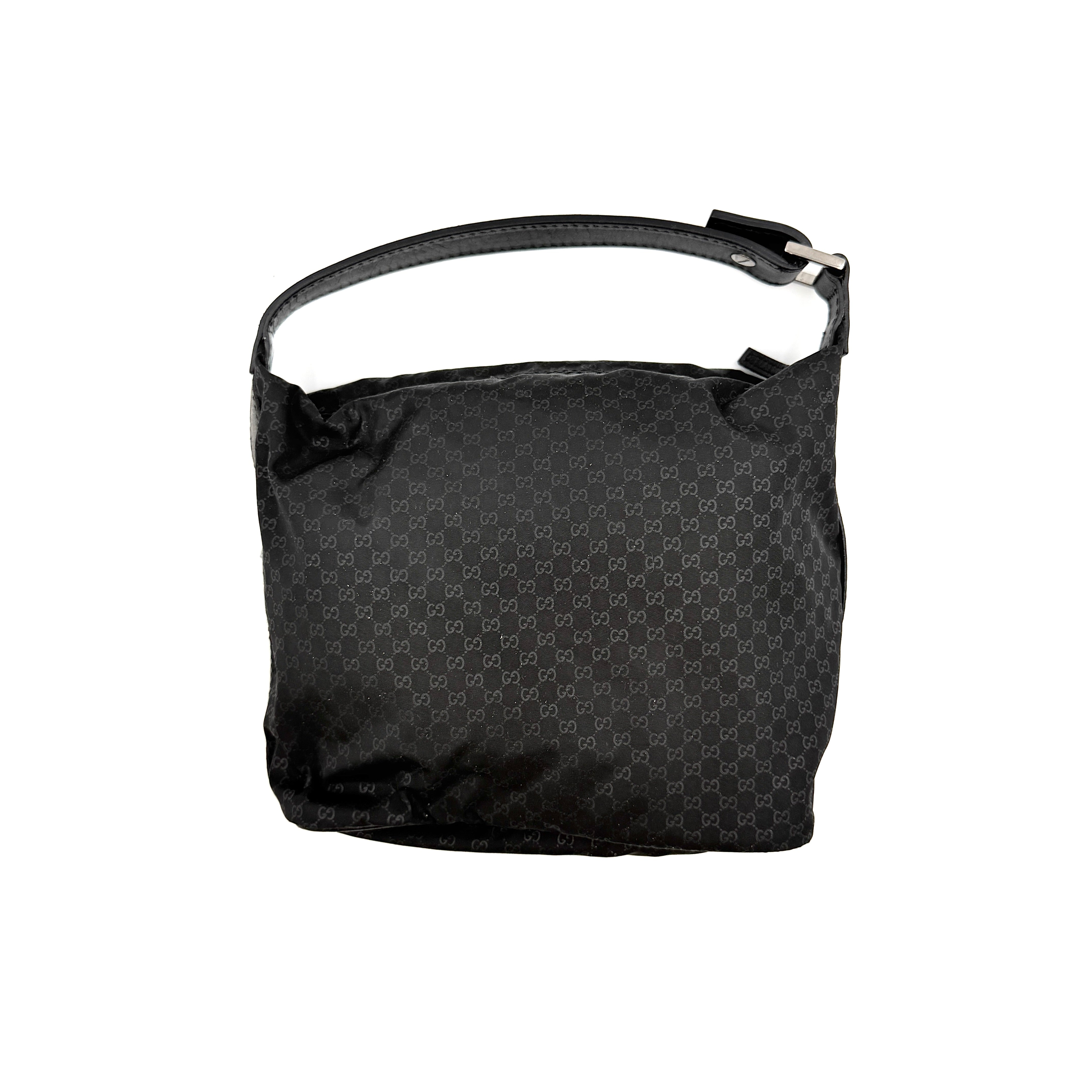 Gucci GG Monogram Mini Hobo black nylon shoulder bag with leather trim and silver-tone hardware, displayed on a plain background.