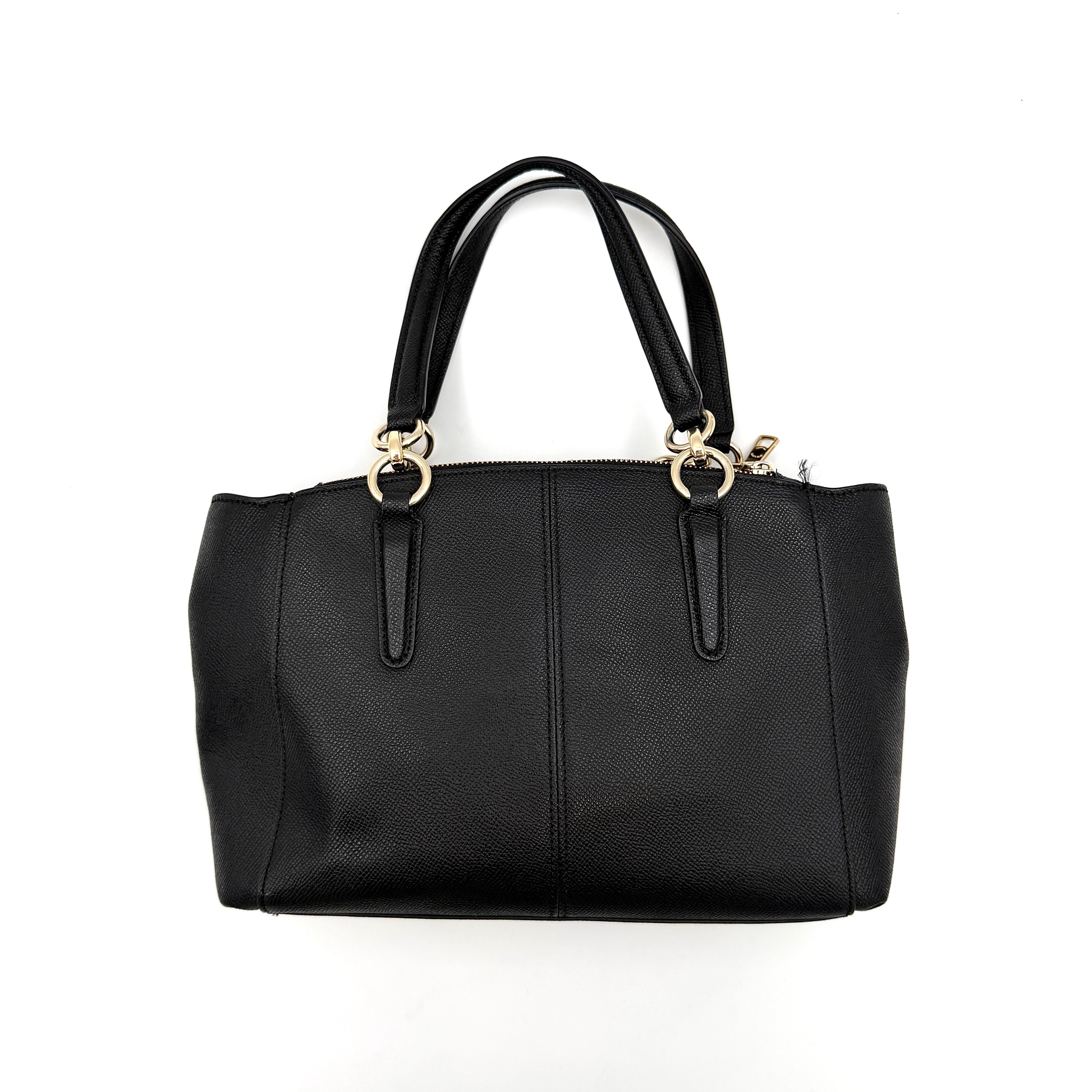 Coach 2Way Christie Carryall Handbag in black leather with gold hardware, detachable strap displayed alongside.
