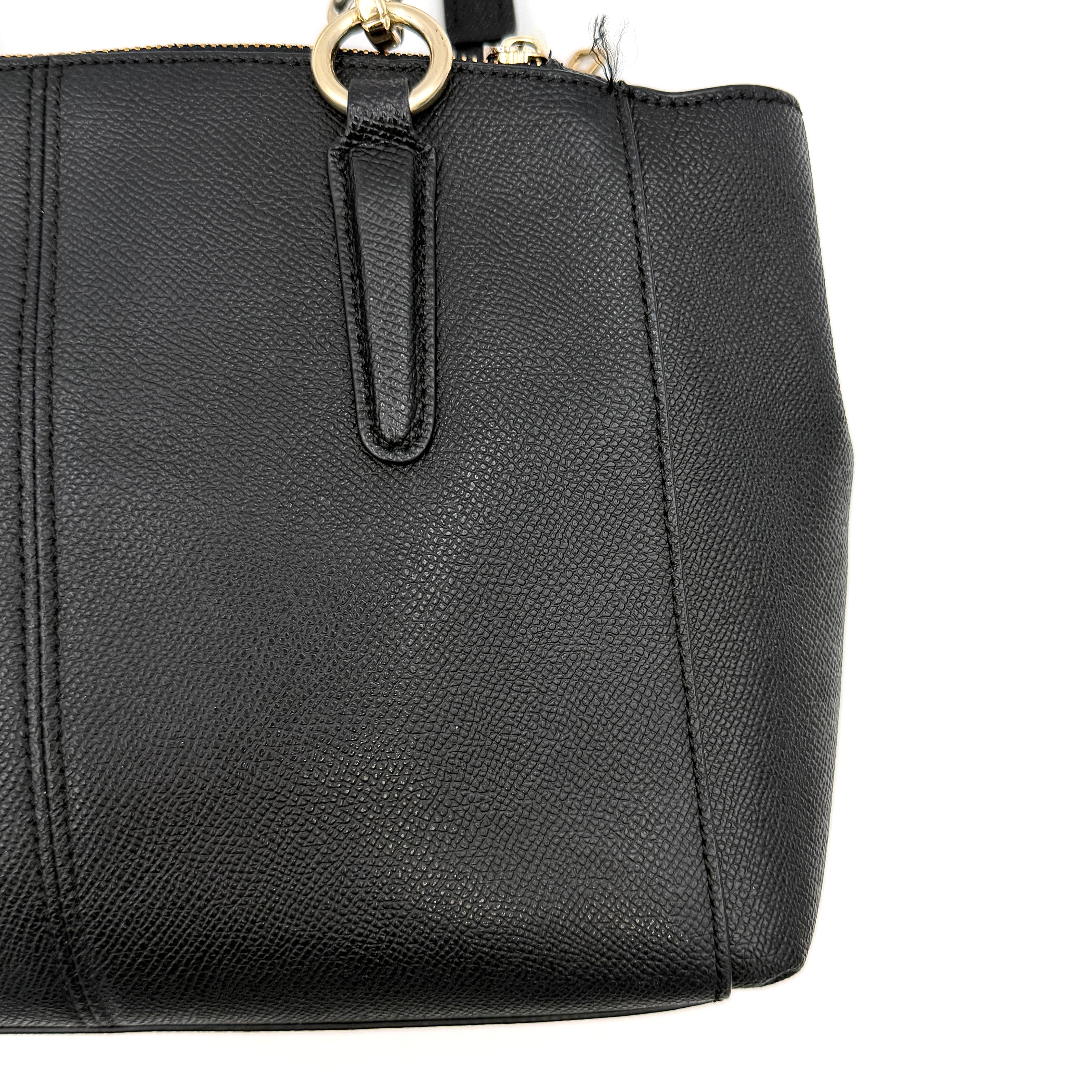 Coach 2Way Christie Carryall Handbag in black leather with gold hardware, detachable strap displayed alongside.