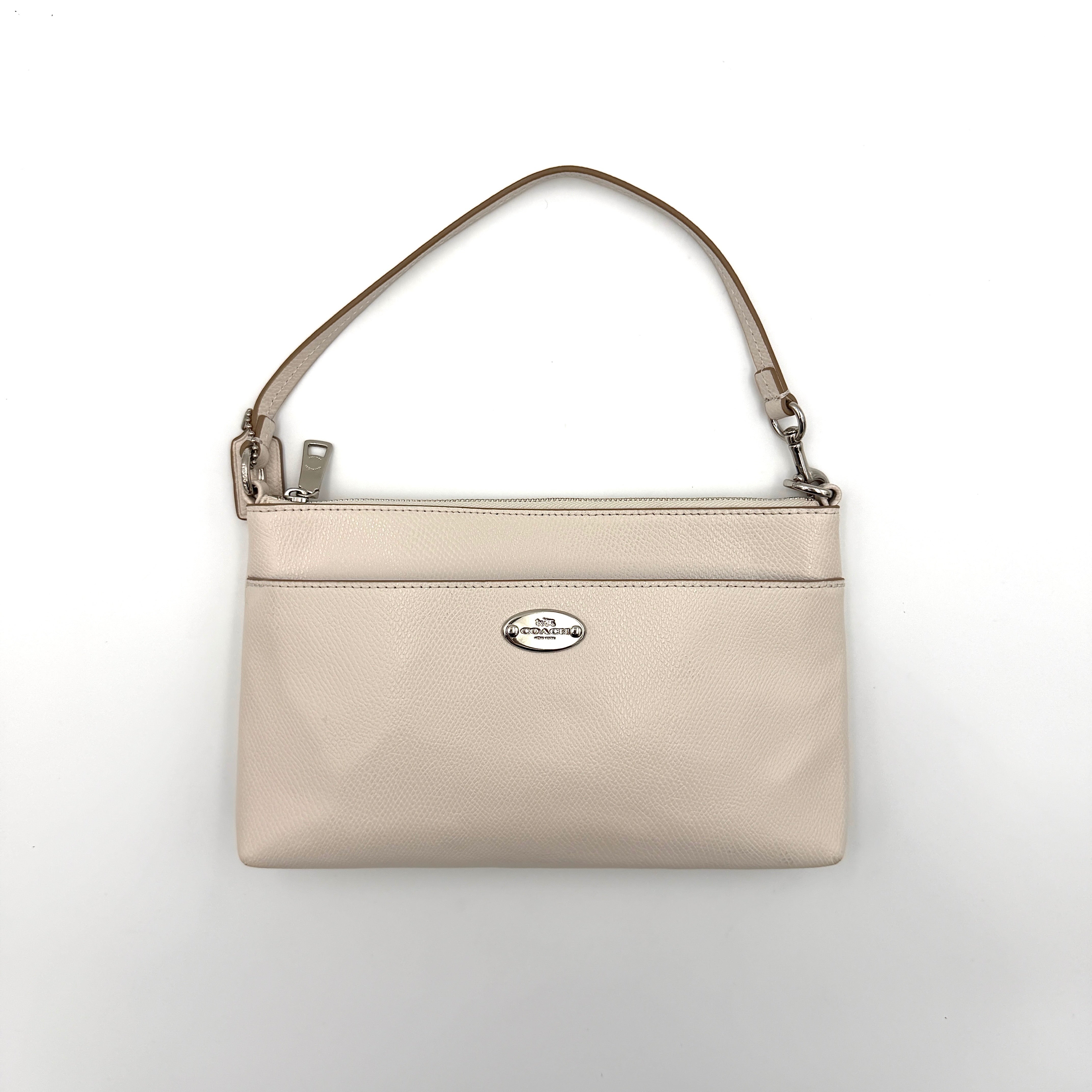 Coach 2in1 Floral Pop Pouch Shoulder Bag in ivory leather with detachable top handle and silver hardware, featuring a navy floral printed insert.