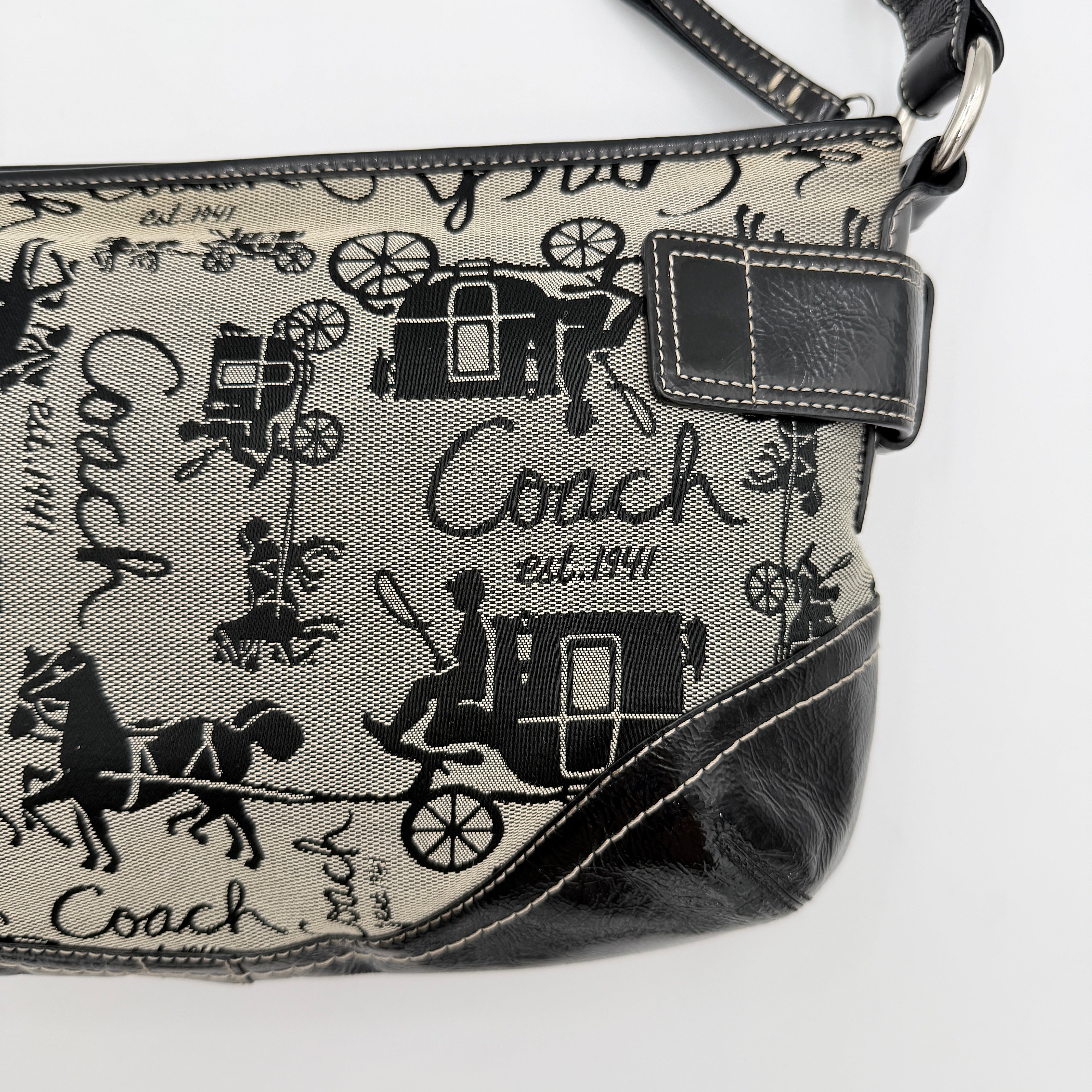 Coach 2Way Horse Carriage Sufflette Shoulder Bag in grey and black canvas with leather trim and adjustable strap.