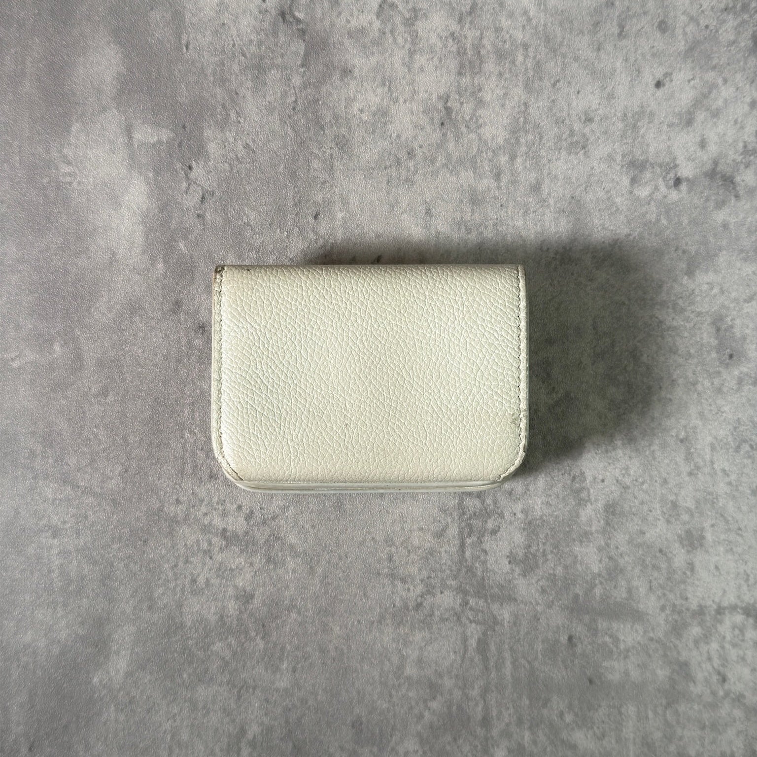 Balenciaga BB Logo Mini Tri-fold White Leather Wallet with silver BB logo, showcasing internal compartments and minimal wear.