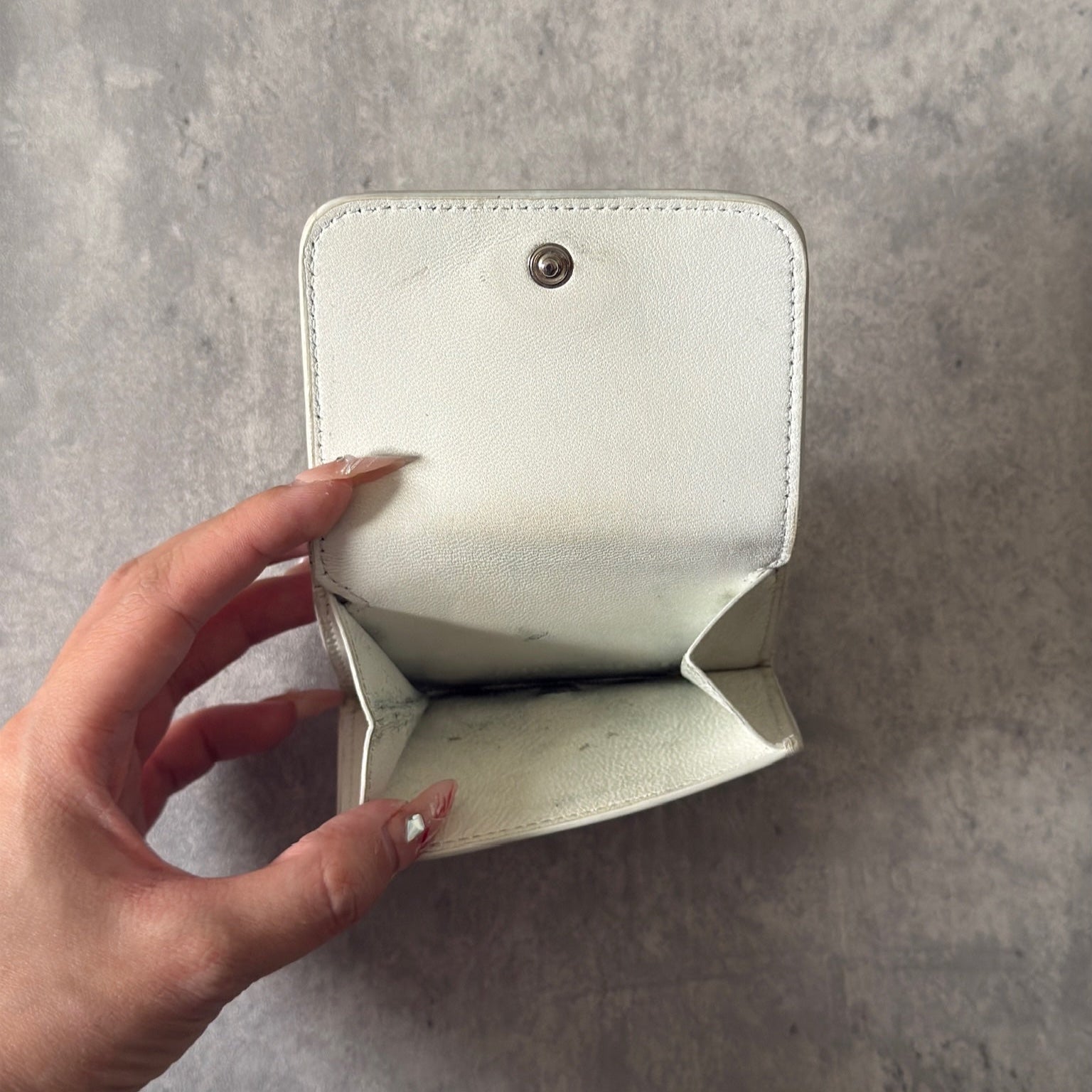Balenciaga BB Logo Mini Tri-fold White Leather Wallet with silver BB logo, showcasing internal compartments and minimal wear.