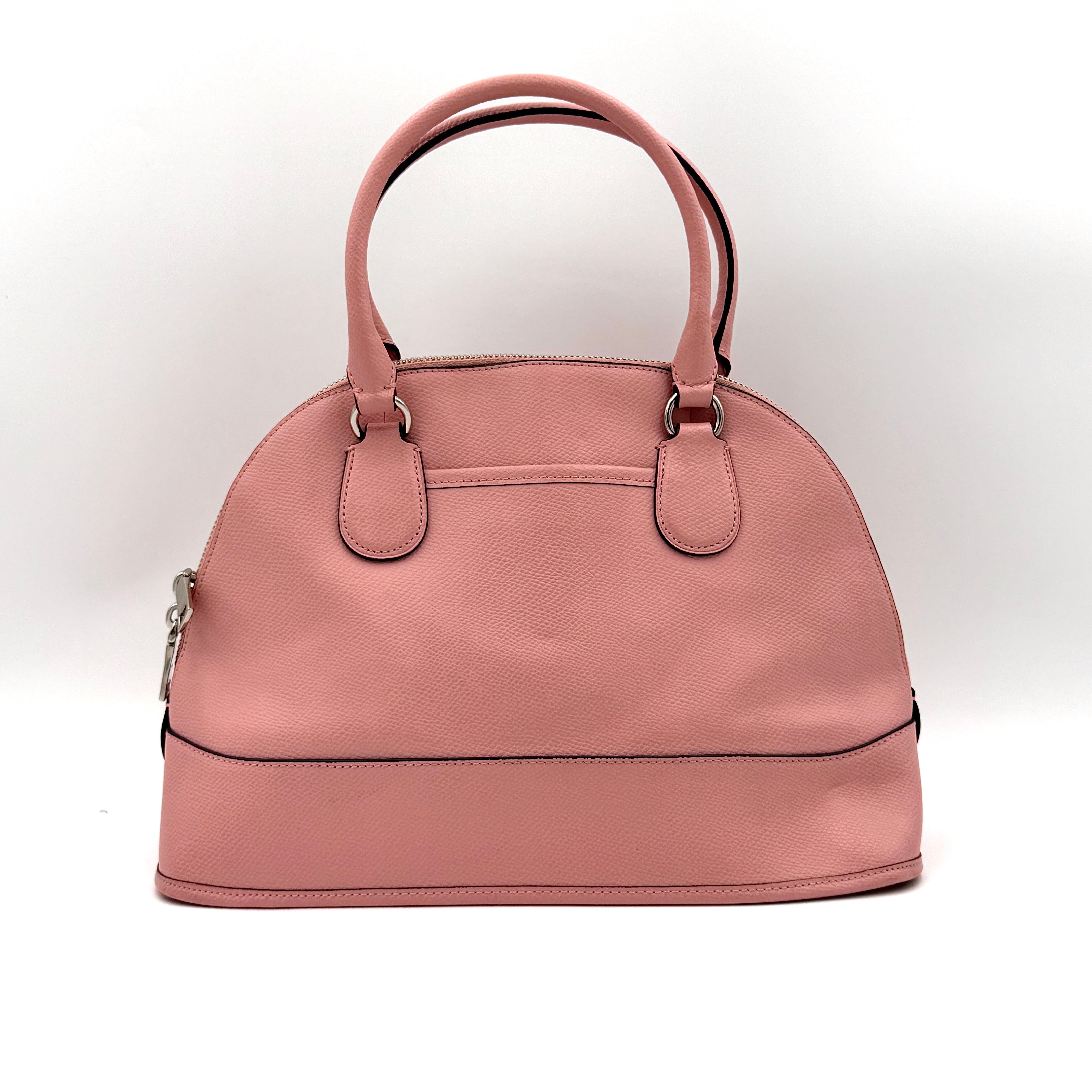 Coach Cora Domed Handbag in light pink leather with silver hardware, styled with double handles and detachable strap.