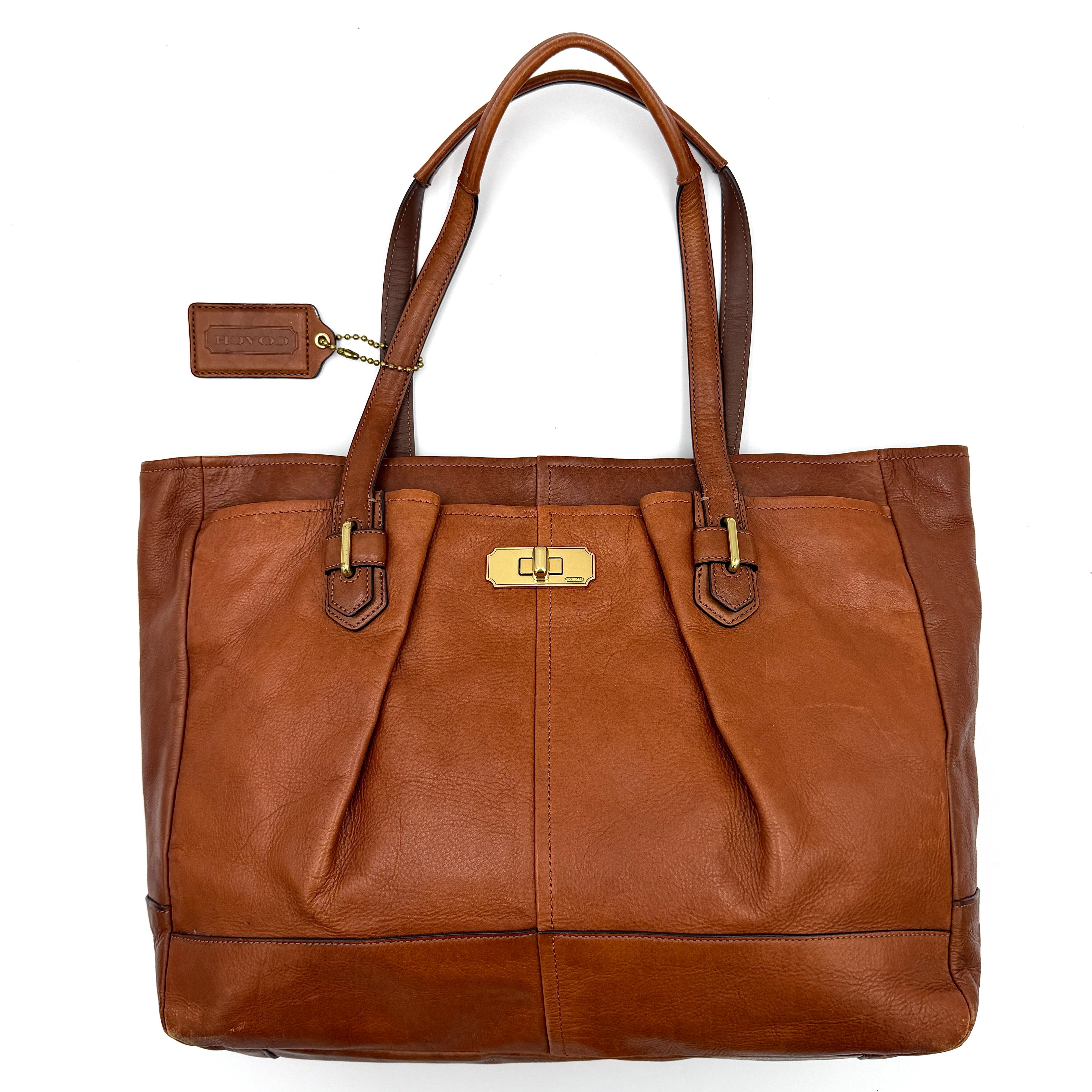 Coach Chelsea Jayden Shoulder Bag in rich brown grained leather, with gold-tone turn-lock and subtle pleated detailing.
