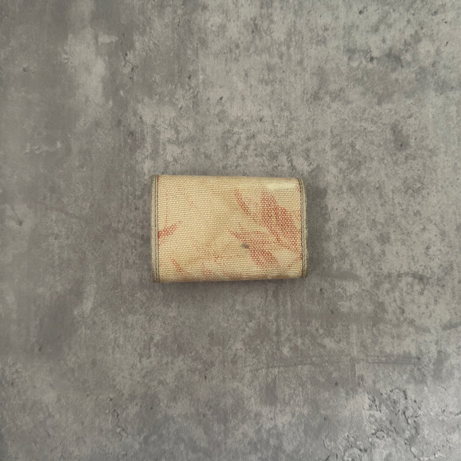 Gucci Herbarium floral pattern key case in beige with red bow, multiple key hooks, and snap closure, available exclusively at Elevated Studios.