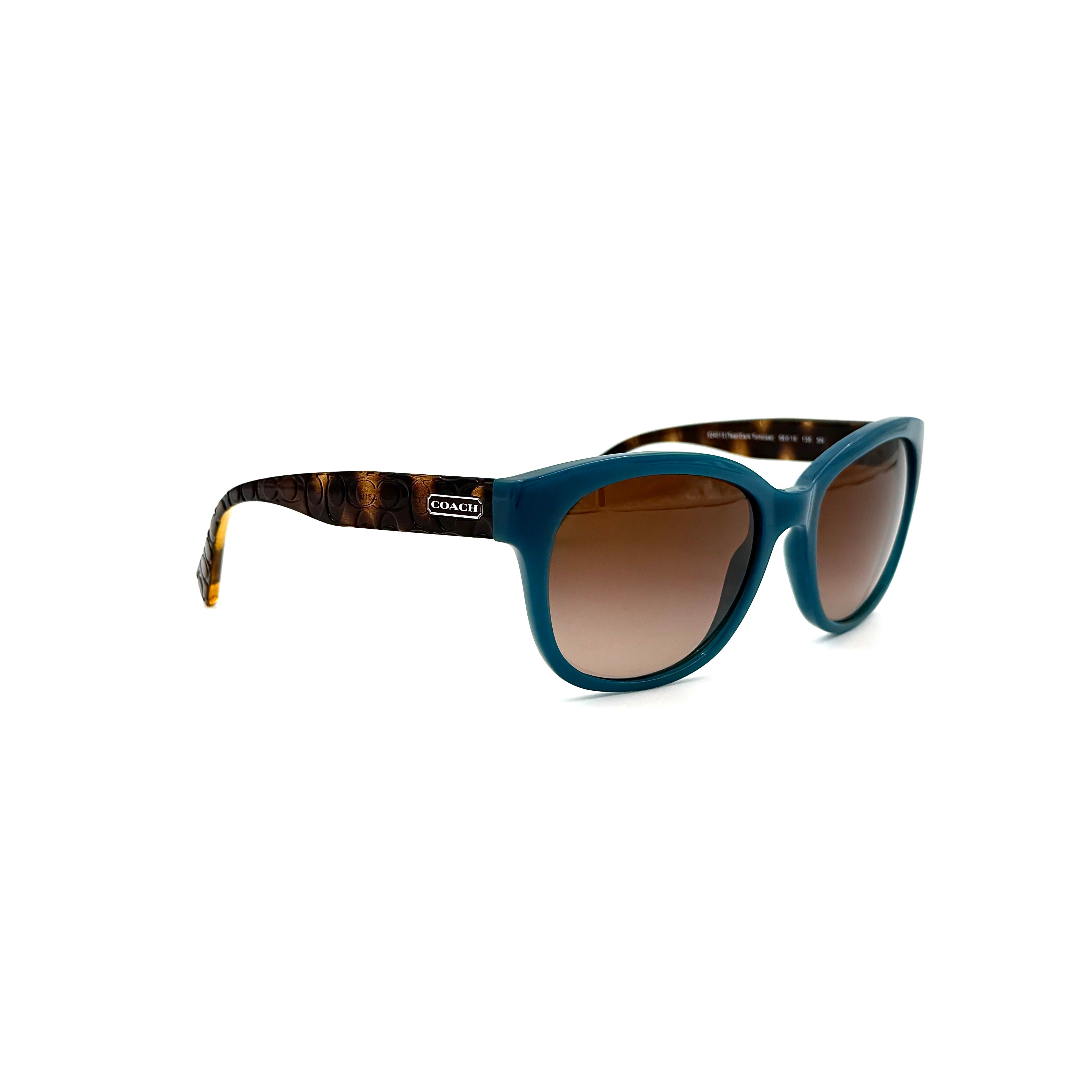 Coach HC8110 sunglasses in teal and dark tortoiseshell acetate with gradient brown lenses, shown at a three-quarter angle.