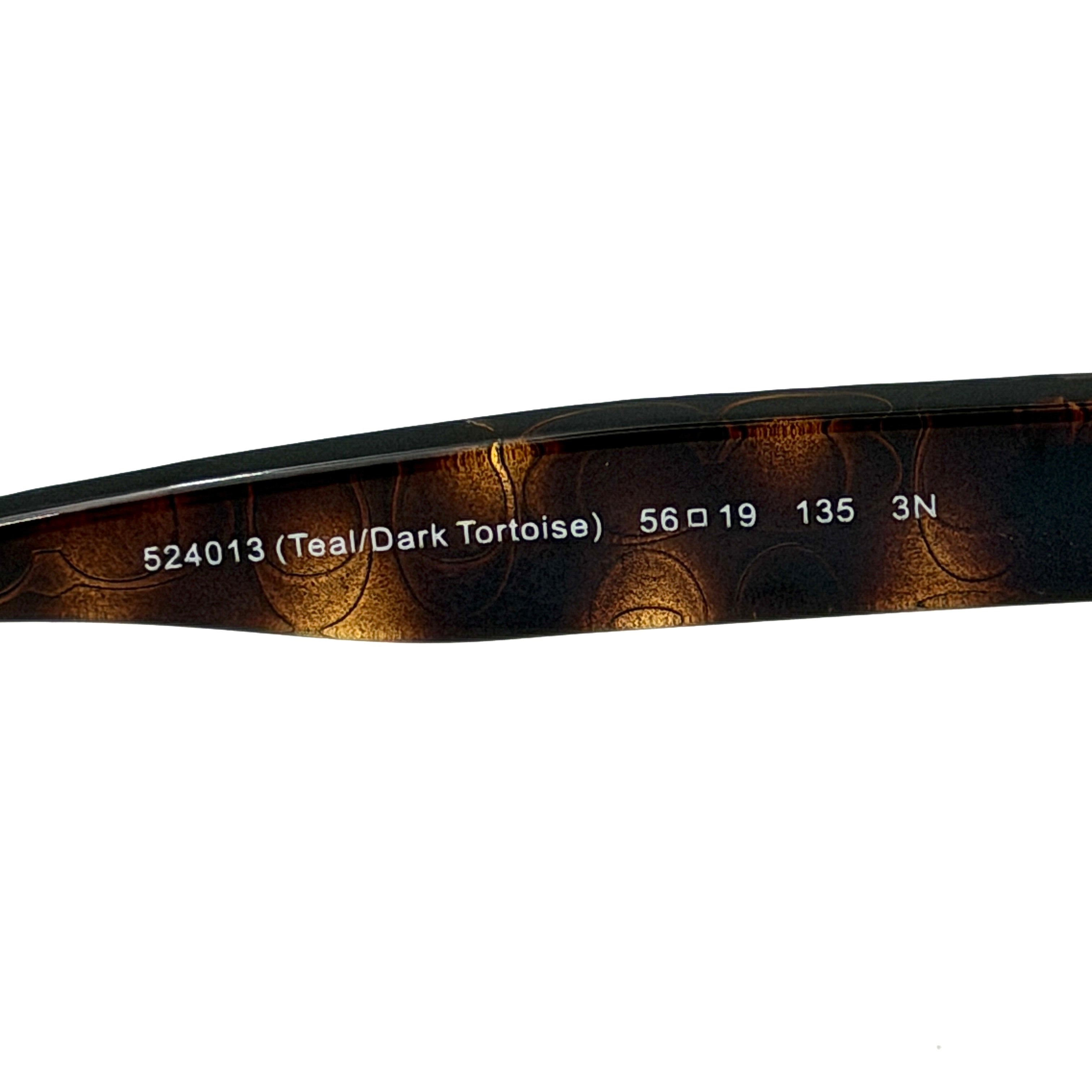 Coach HC8110 sunglasses in teal and dark tortoiseshell acetate with gradient brown lenses, shown at a three-quarter angle.
