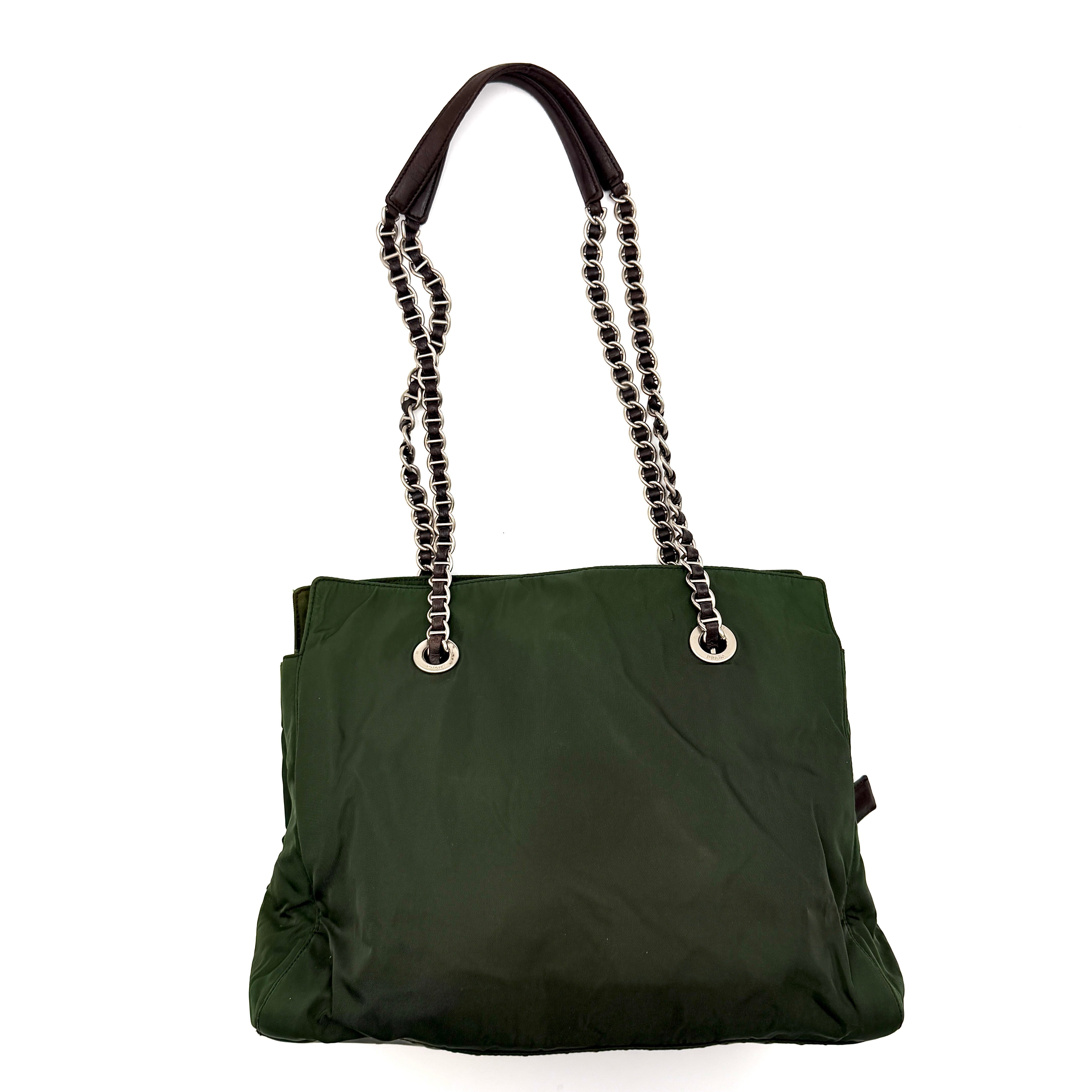 A Prada Tessuto Nylon Chain Shoulder Bag in deep green with silver-tone chain straps, featuring the iconic triangular logo on the front.