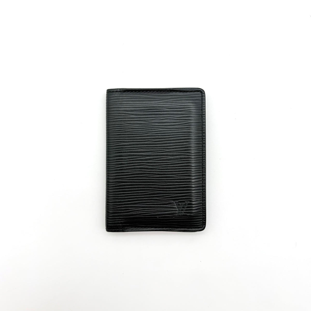 Louis Vuitton black Epi leather pocket organizer with subtle LV embossing and multiple compartments, photographed on a white background.