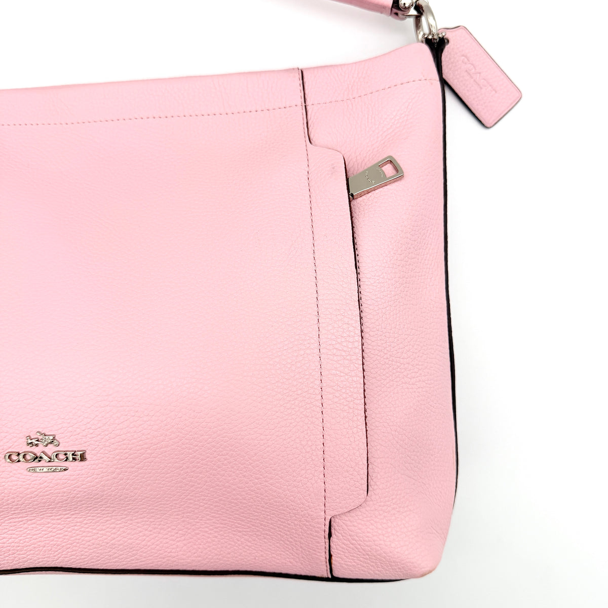 Coach 2Way Scout Hobo in pastel pink leather with silver hardware, shown with handle and detachable strap.