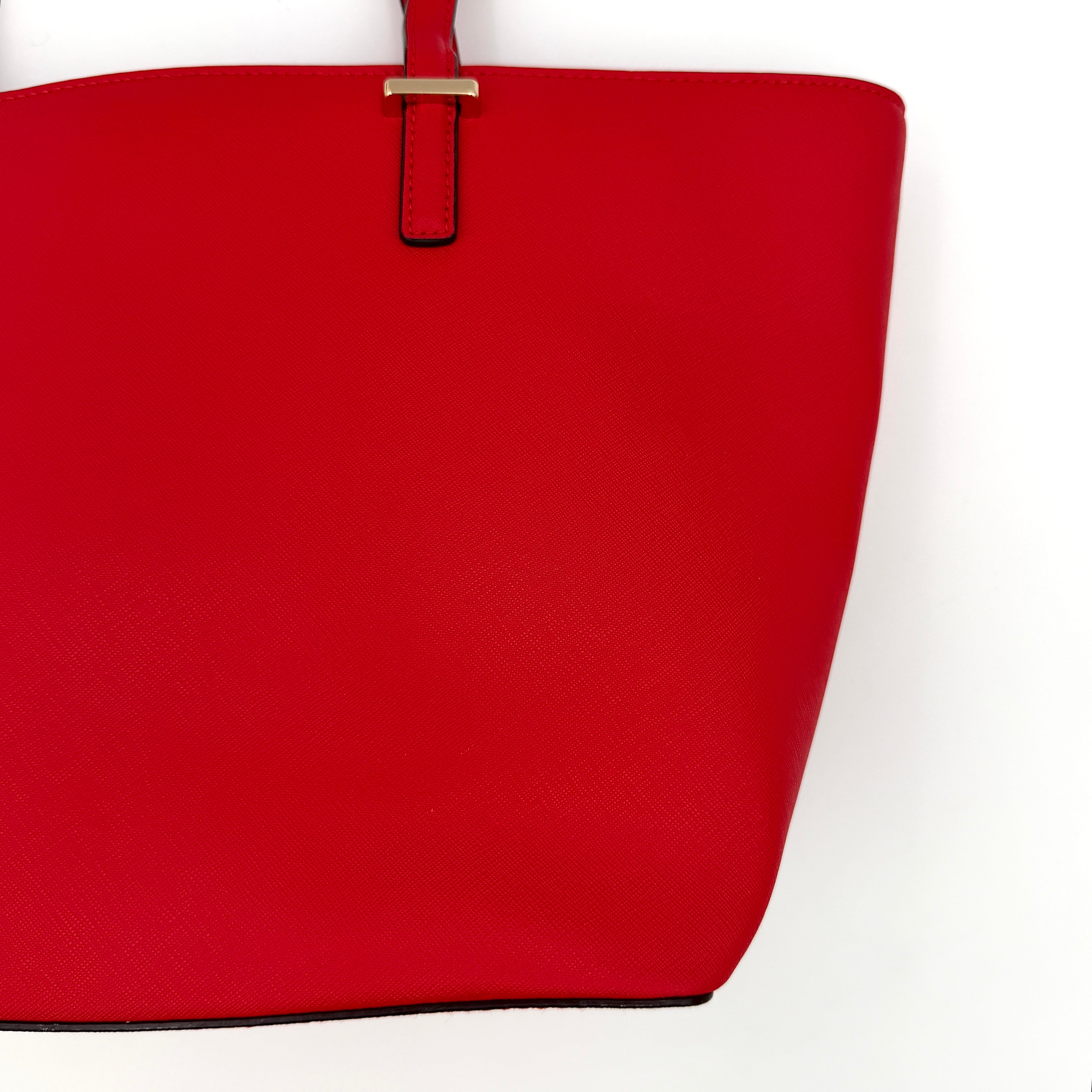 Kate Spade Cedar Street Harmony Tote bag in bold red saffiano leather, featuring dual top handles and gold-tone details.