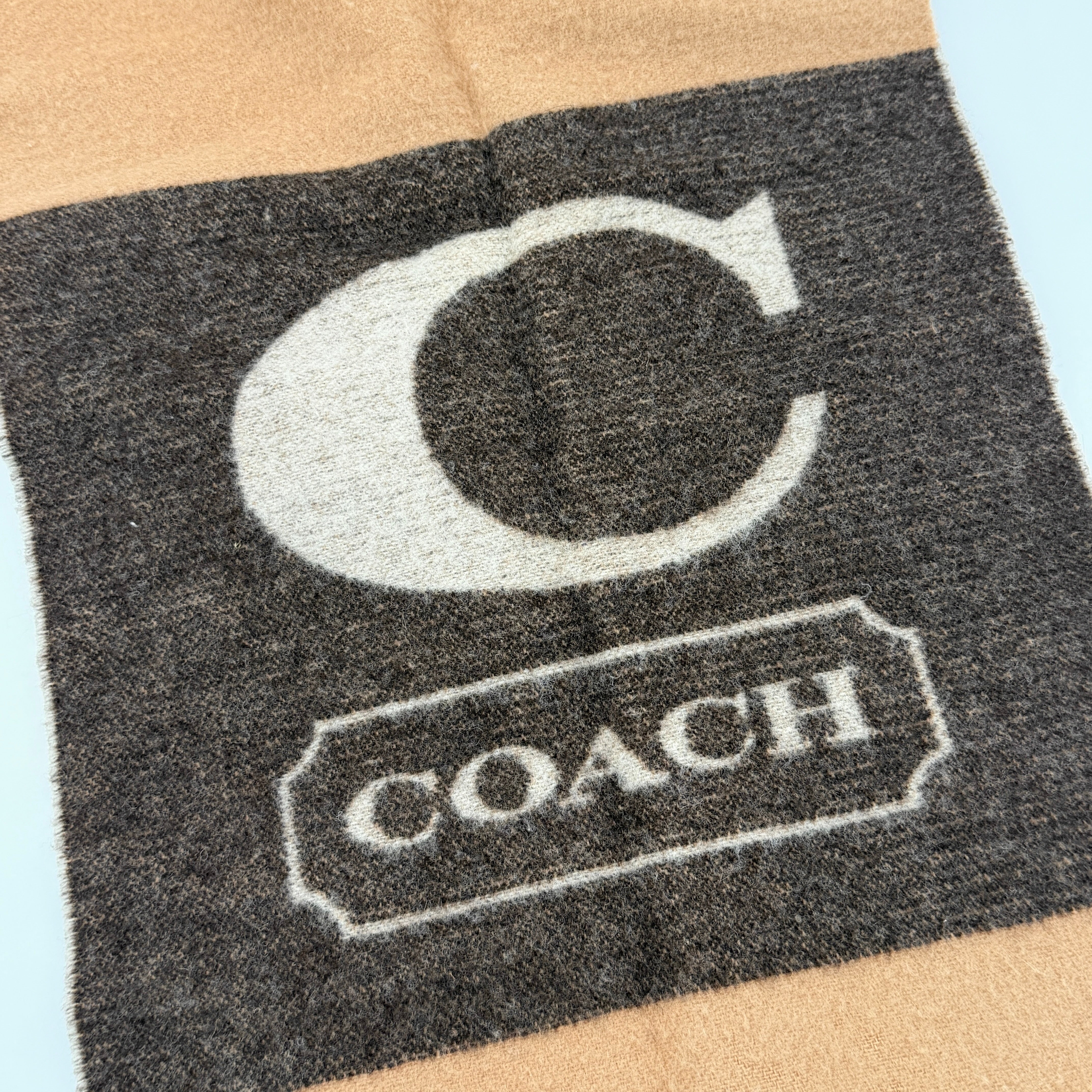 Coach reversible brown lambswool scarf with large logo and camel fringe detail