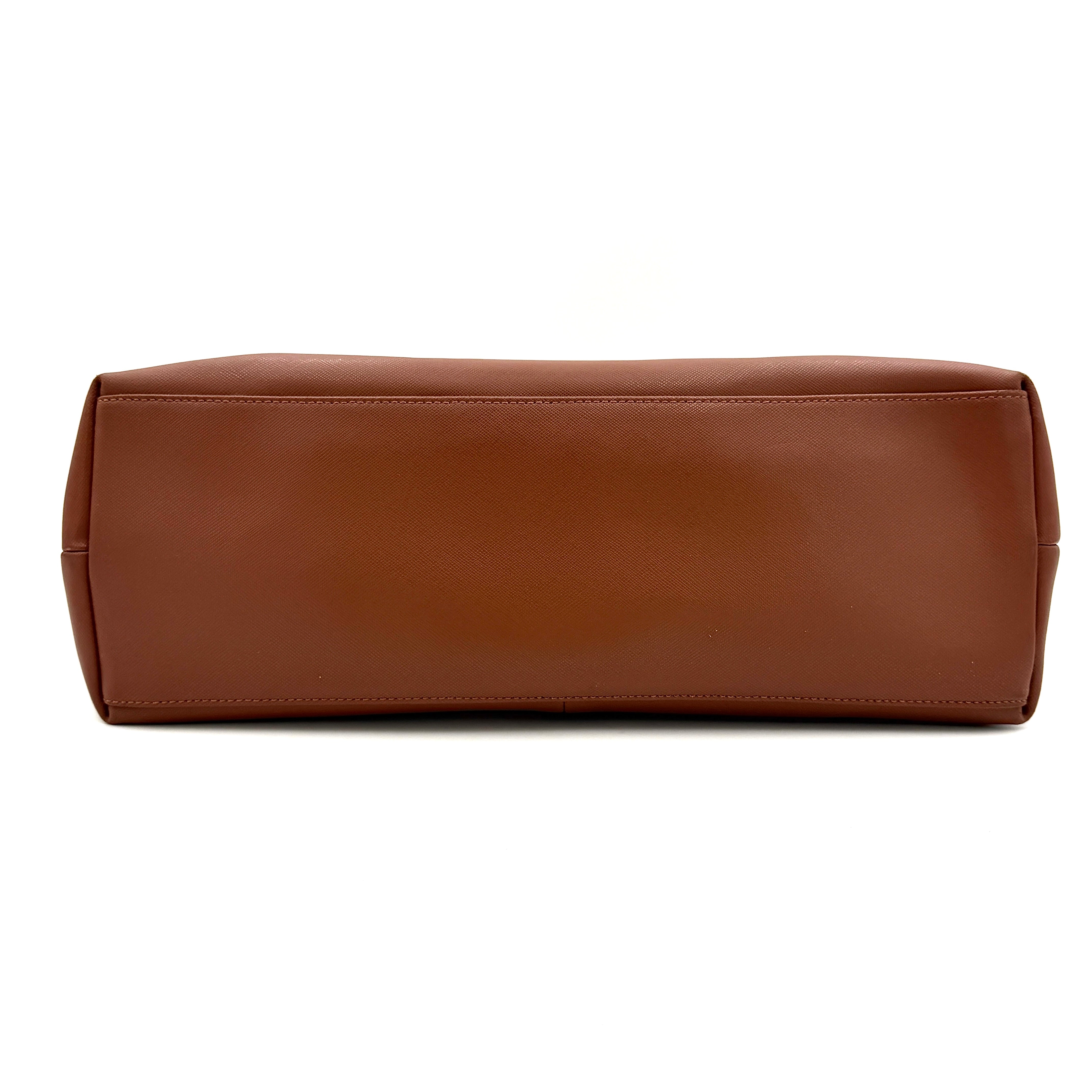 Coach Peyton Chain Shoulder Bag in brown leather with gold-tone chain handles, styled against a clean background.