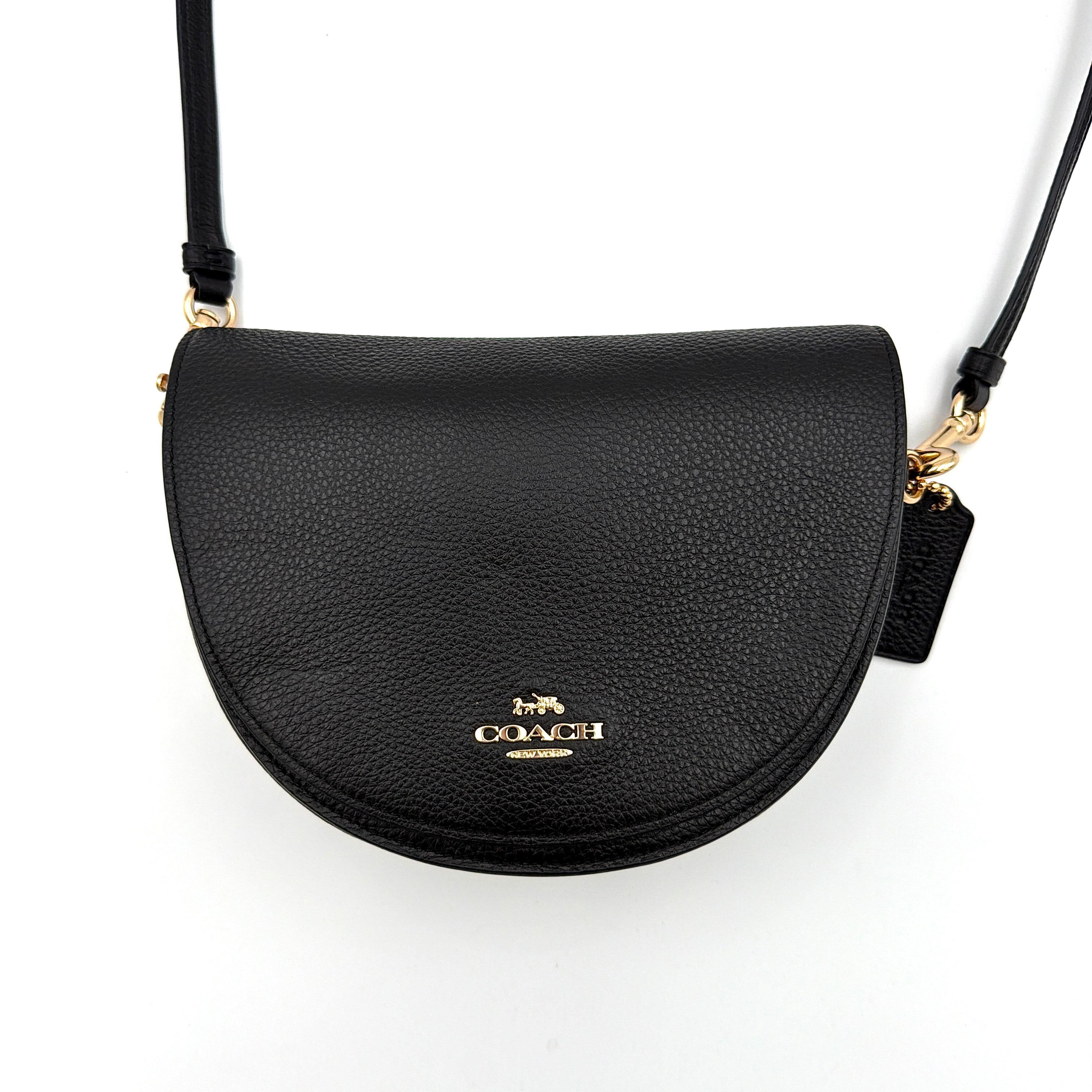 Coach Ellen Crossbody Bag in black pebbled leather with a half-moon silhouette, gold-tone hardware, and adjustable strap.