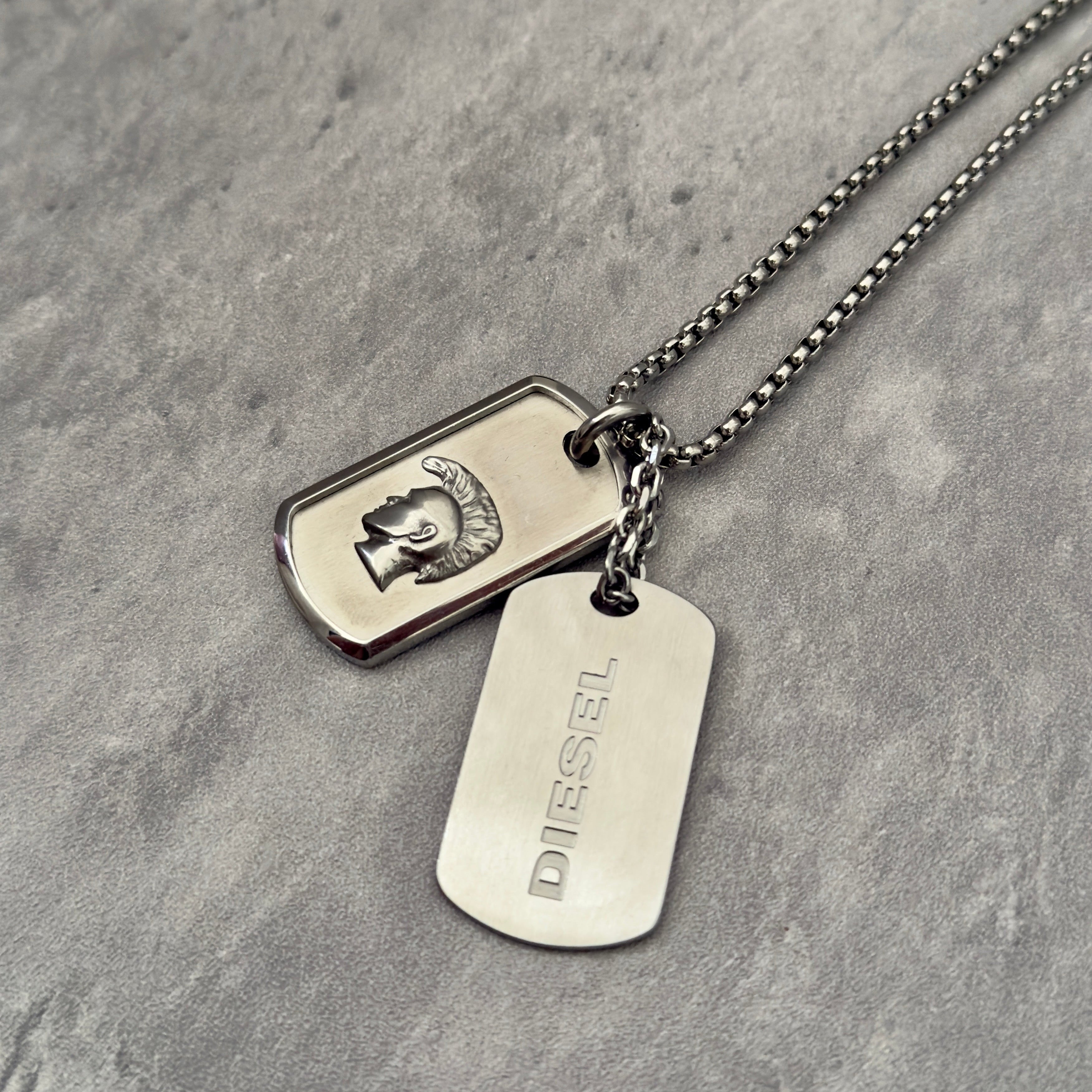 Diesel Double Plate Dog Tag Pendant Necklace in silver-tone stainless steel, featuring a Mohawk head engraving and Diesel logo.