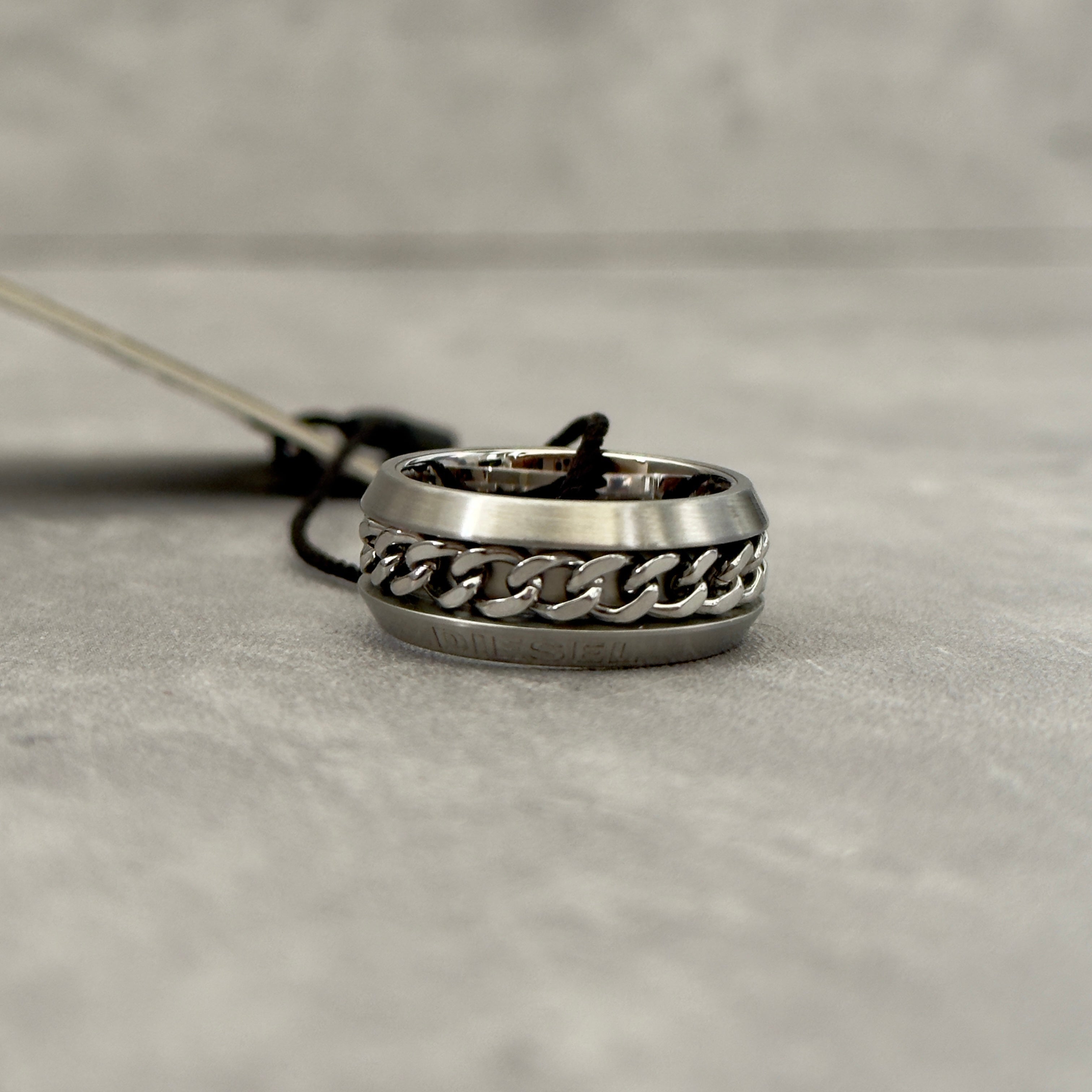 Diesel Stainless Steel Chain Inlay Ring with engraved Diesel logo and a bold chain-link detail.