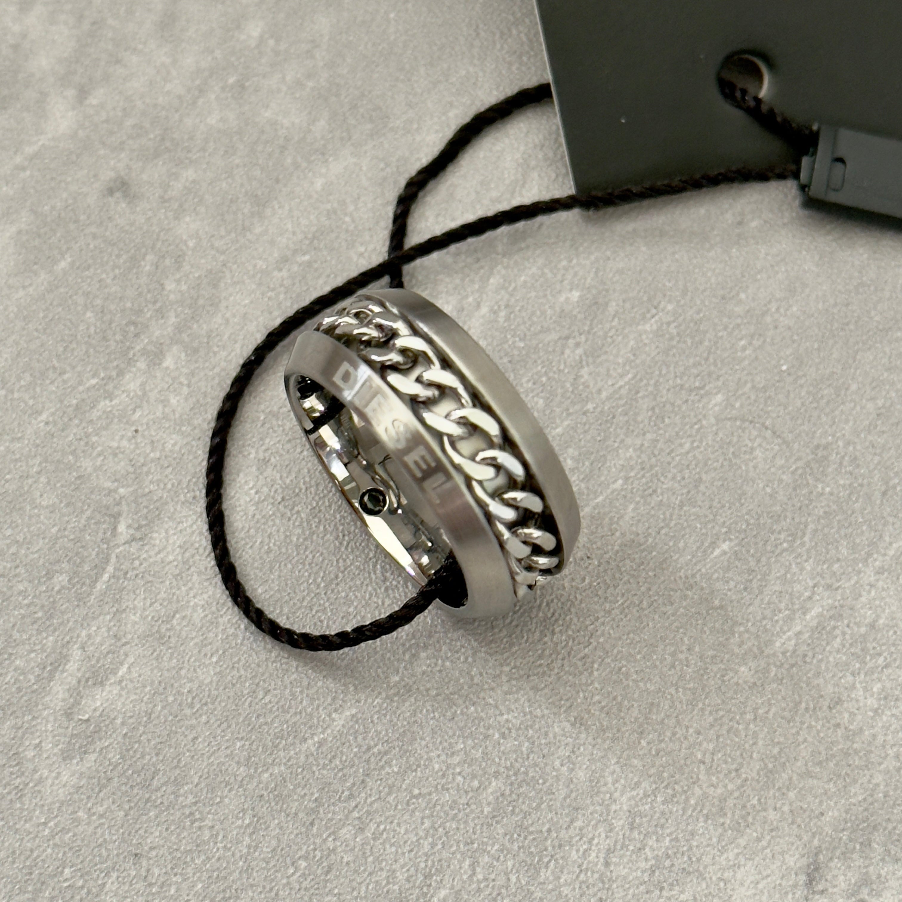 Diesel Stainless Steel Chain Inlay Ring with engraved Diesel logo and a bold chain-link detail.