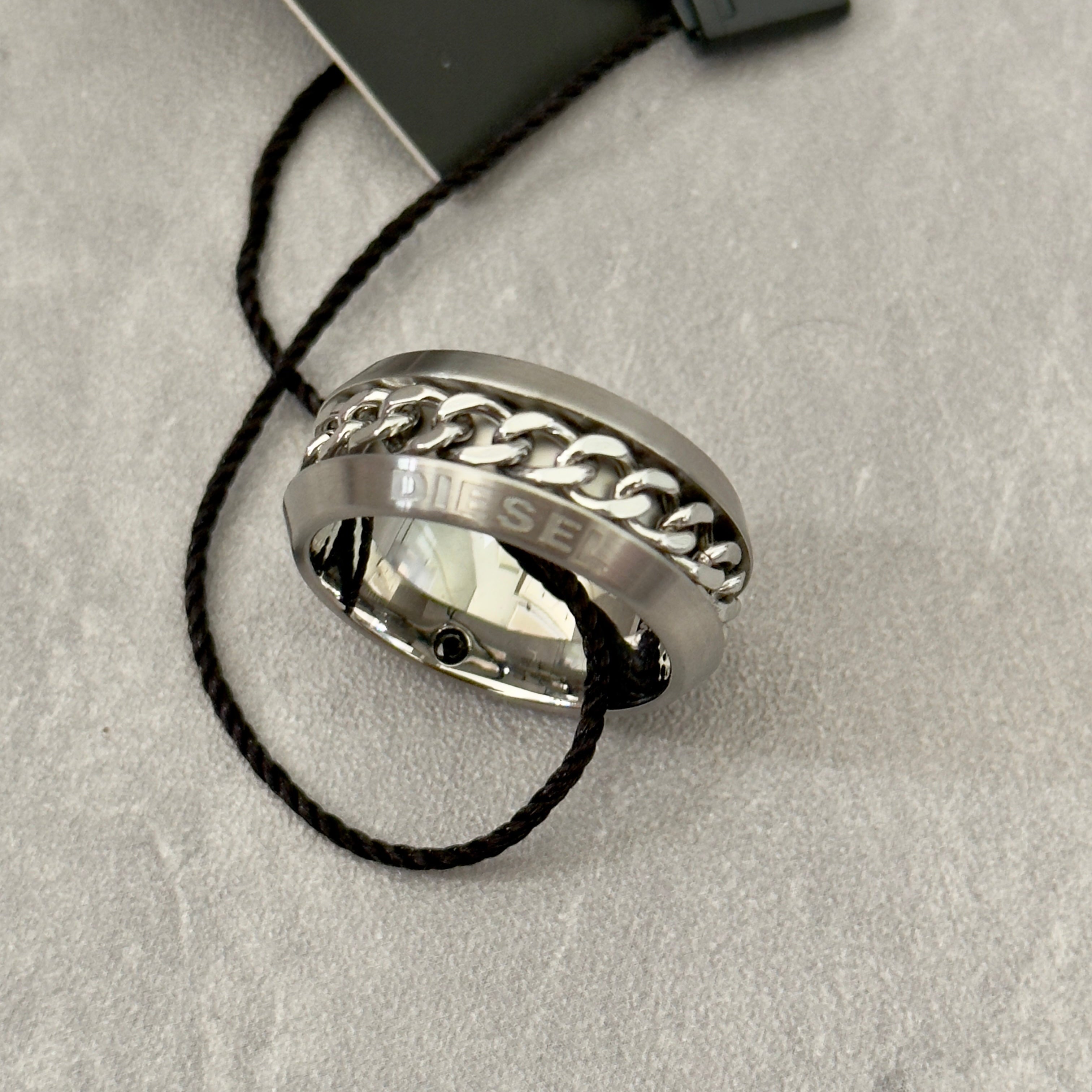 Diesel Stainless Steel Chain Inlay Ring with engraved Diesel logo and a bold chain-link detail.