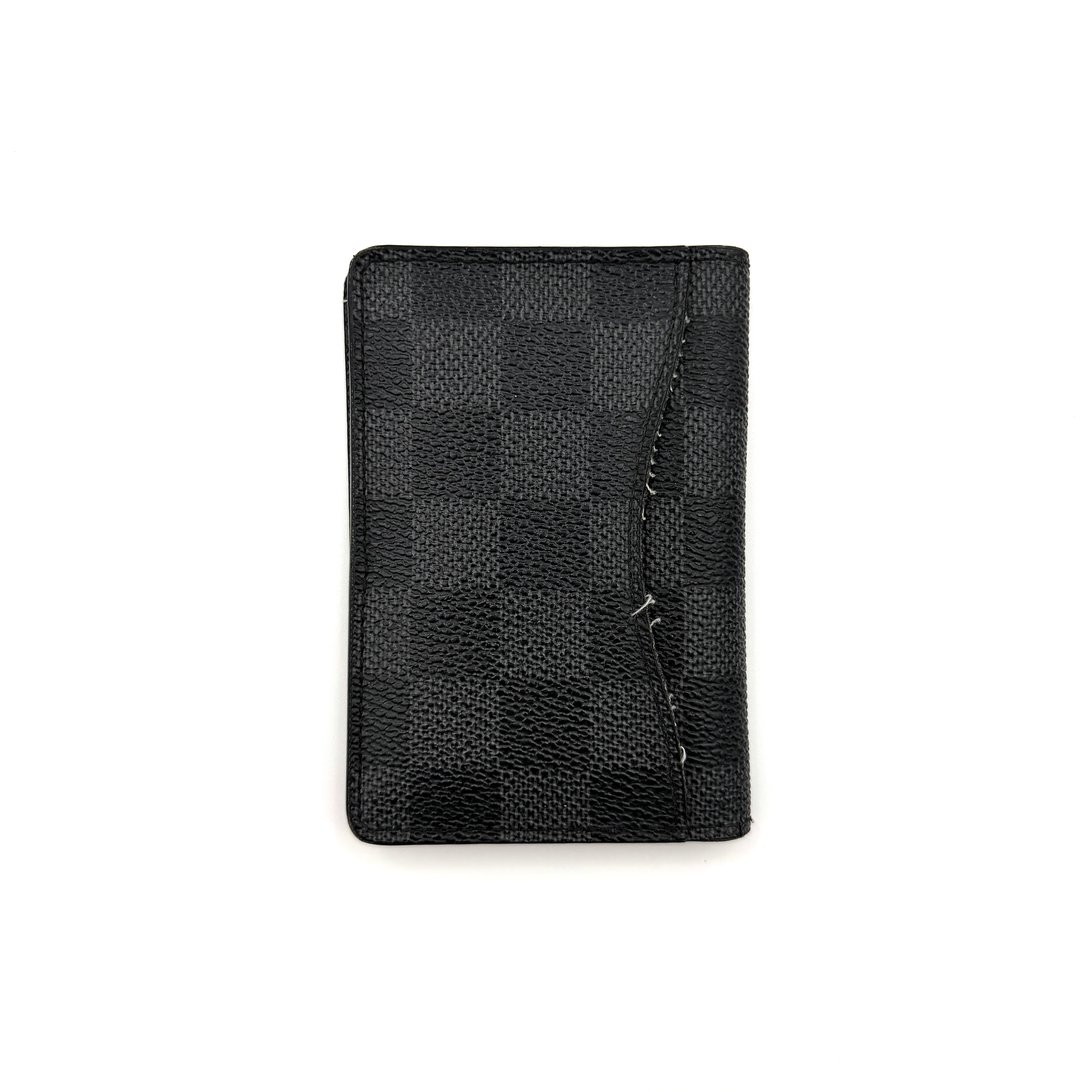 Louis Vuitton Damier Graphite Pocket Organizer in black coated canvas with tonal checkerboard pattern and slim profile.