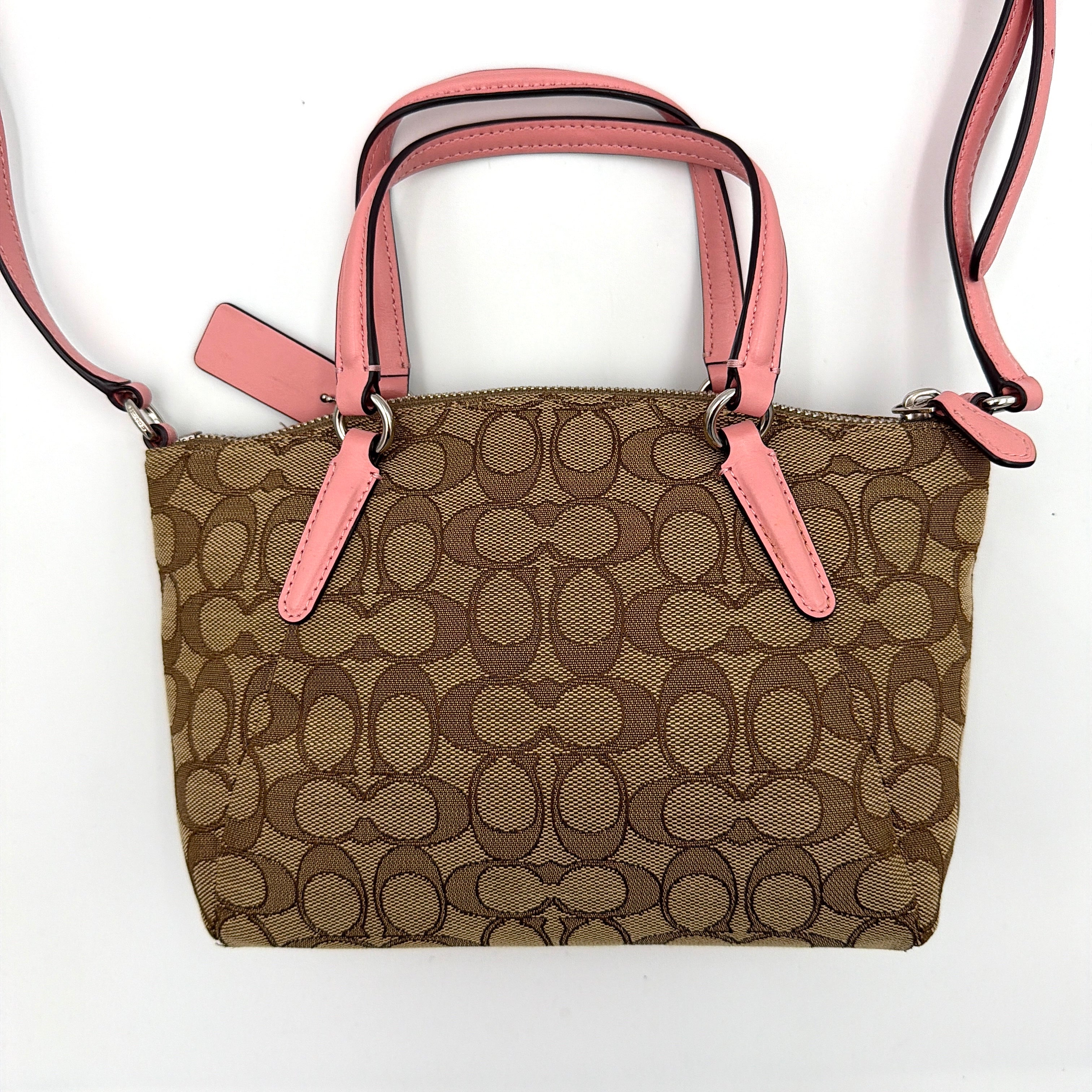 Coach 2Way Kelsey Shoulder Bag with beige monogram canvas and pink leather accents, shown with adjustable shoulder strap.