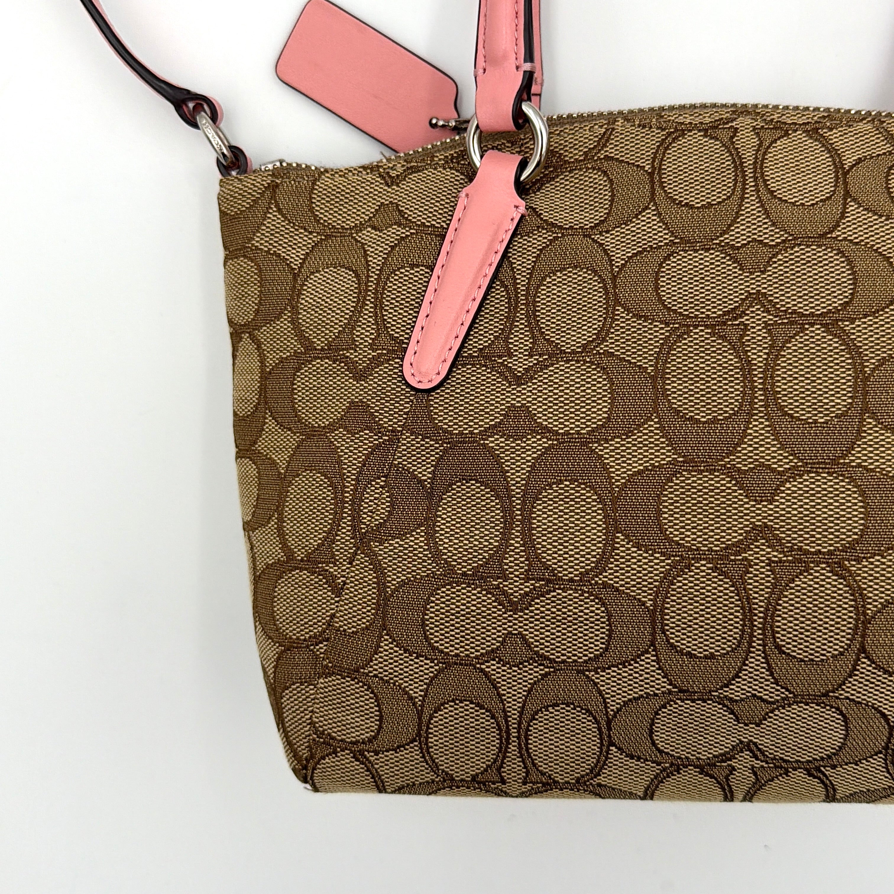 Coach 2Way Kelsey Shoulder Bag with beige monogram canvas and pink leather accents, shown with adjustable shoulder strap.