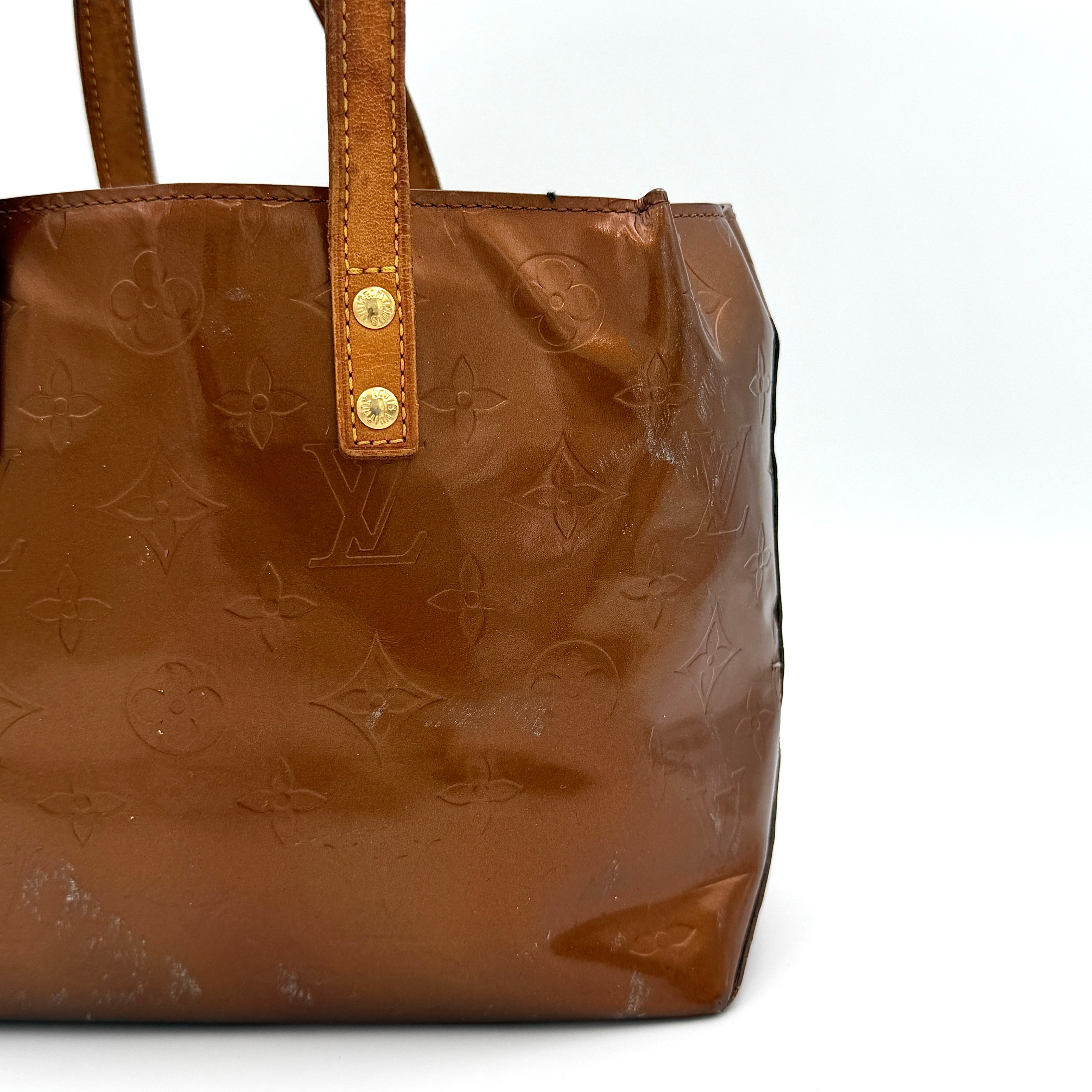 Louis Vuitton PM Vernis Reade Shoulder Bag in glossy bronze patent leather with monogram embossing and structured silhouette.