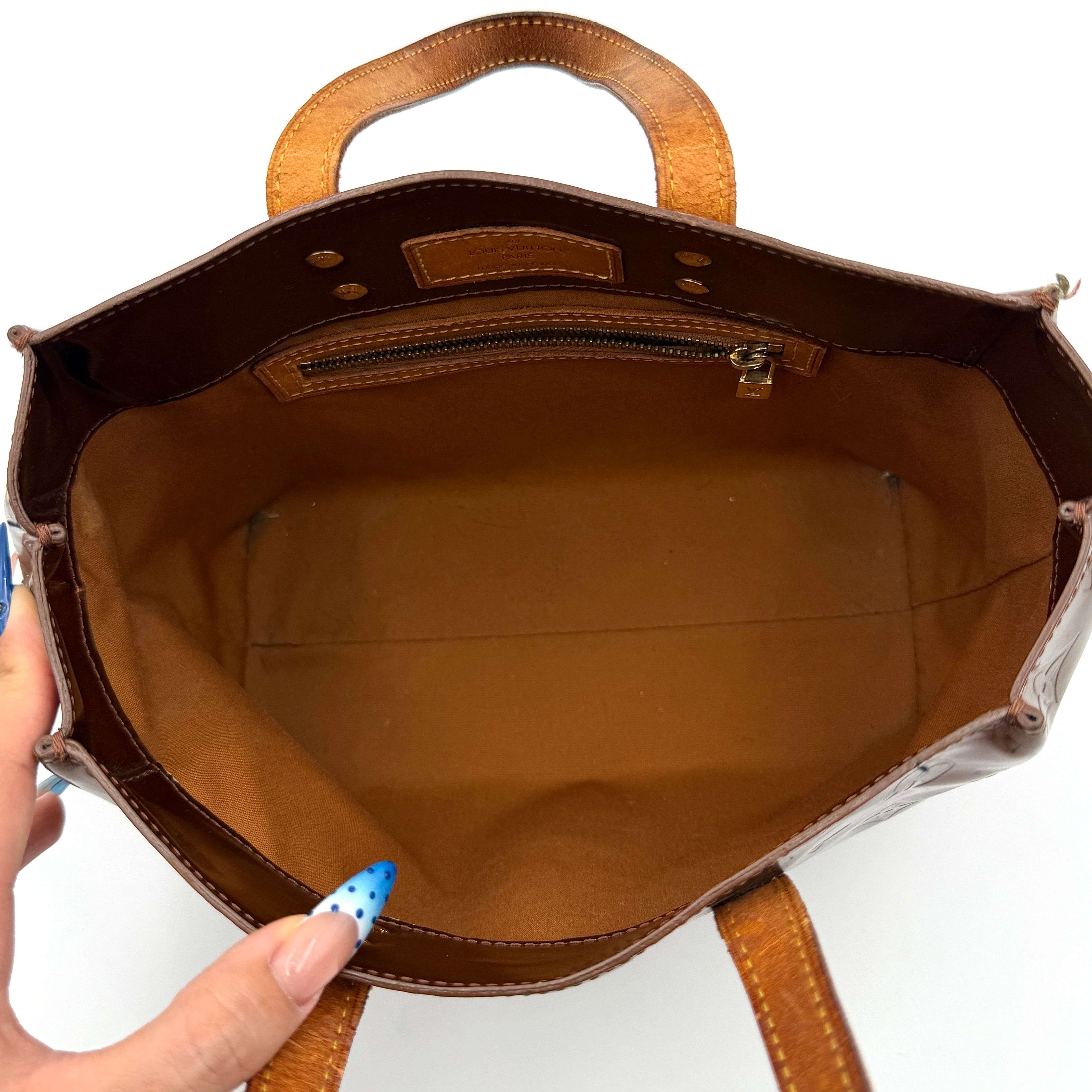 Louis Vuitton PM Vernis Reade Shoulder Bag in glossy bronze patent leather with monogram embossing and structured silhouette.