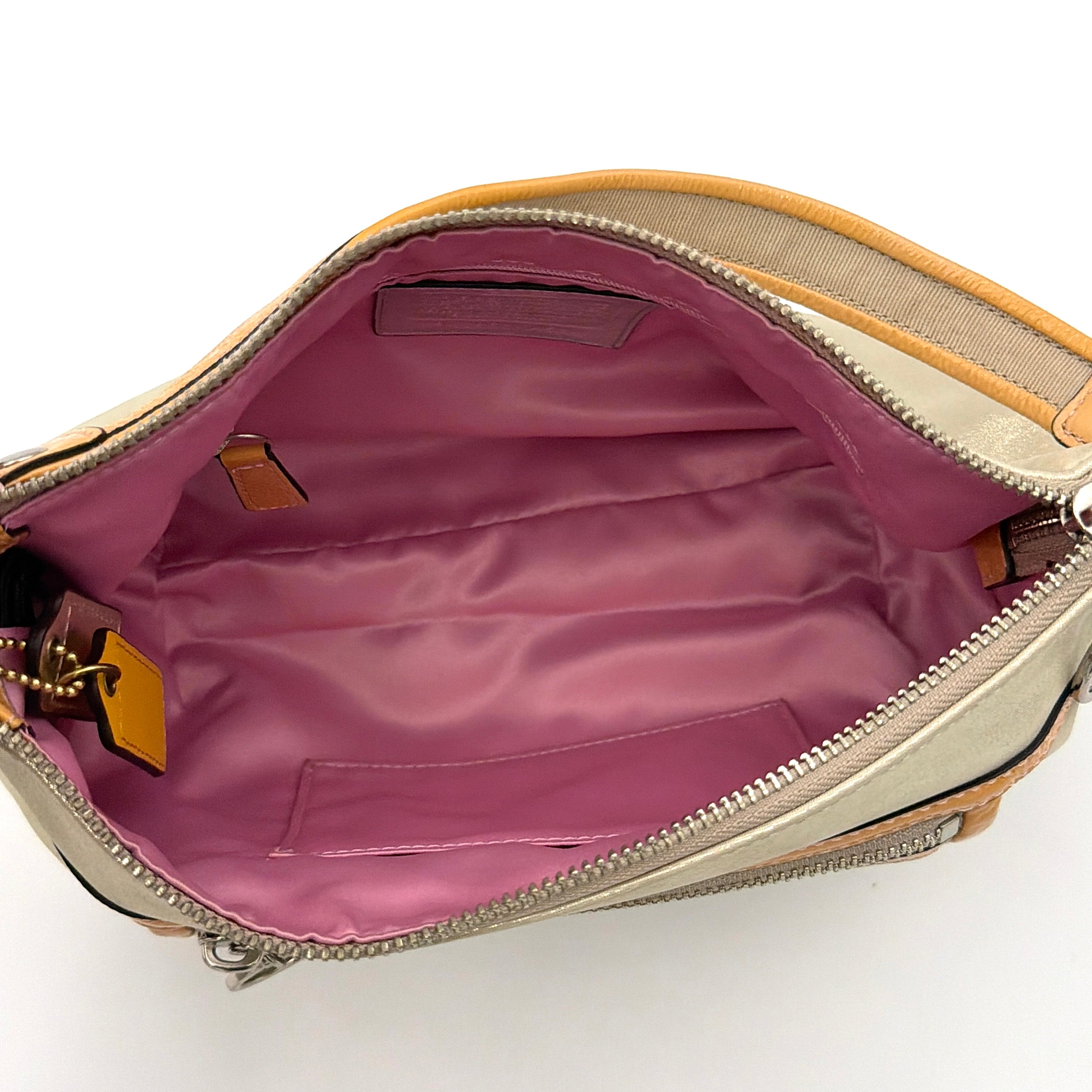 Coach Poppy Sparkle Groovy bag in cream with tan trim, metallic plaque, and detachable shoulder strap displayed alongside.