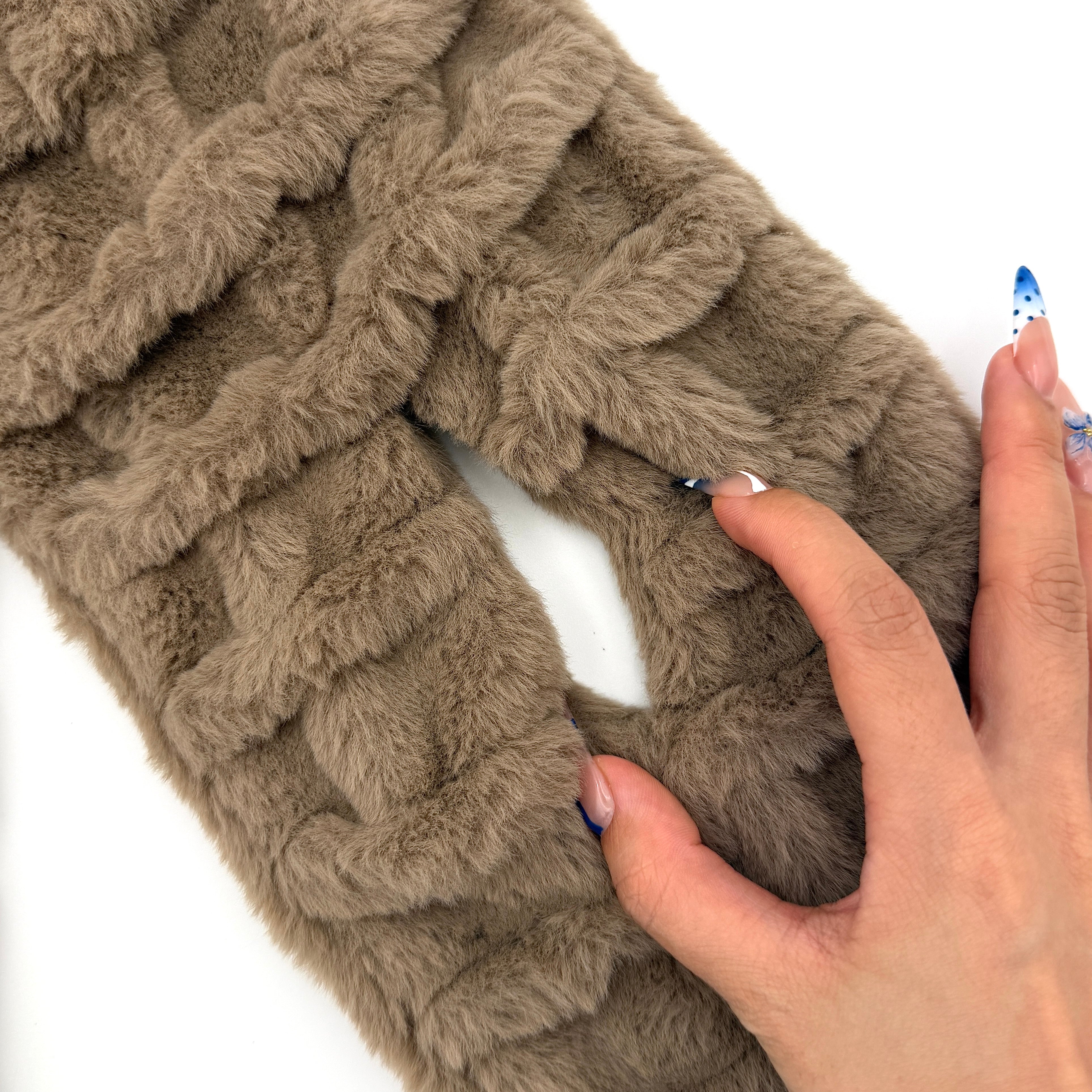 Furla brown faux fur scarf with sculpted ridge texture, gold logo plaque, and slit opening for effortless styling.