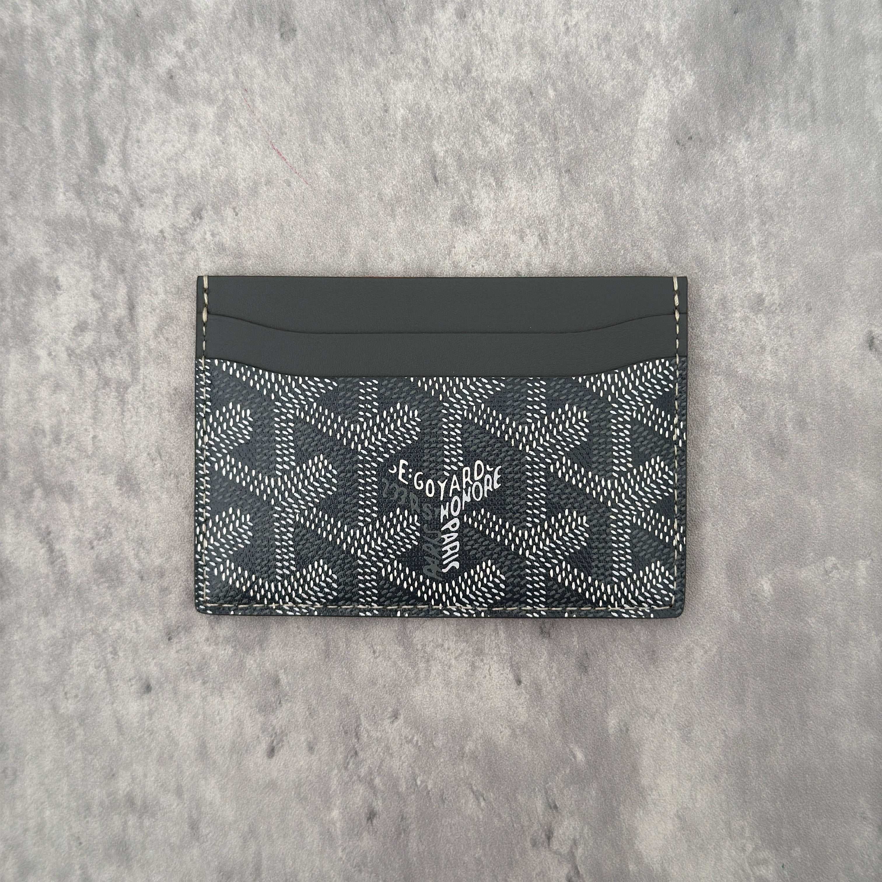 Goyard Grey Goyardine Saint Sulpice Card Holder, featuring iconic monogram canvas with leather trim and multiple card slots.