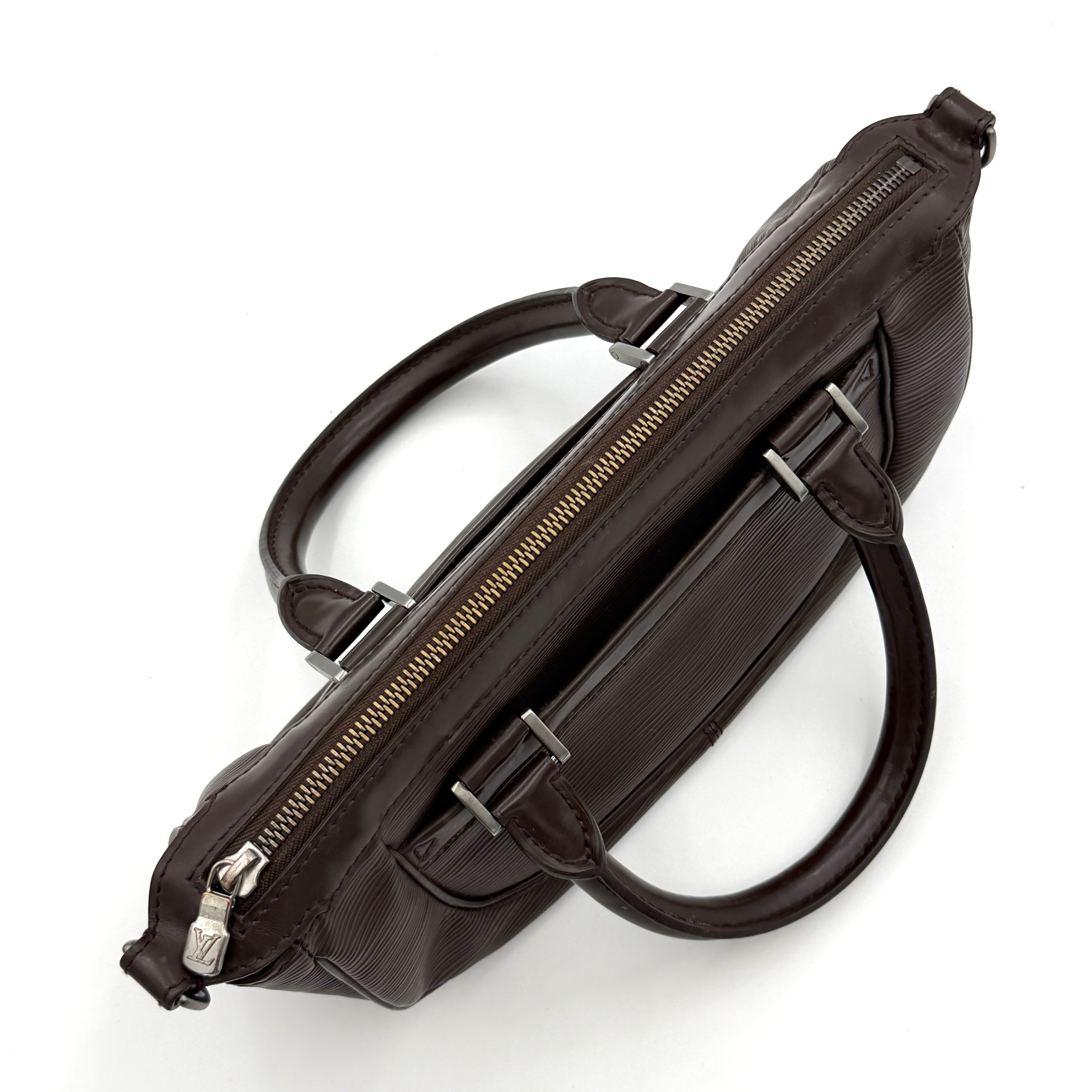 Louis Vuitton Dhanura PM 2Way shoulder bag in brown Epi leather with detachable strap and silver-tone hardware.