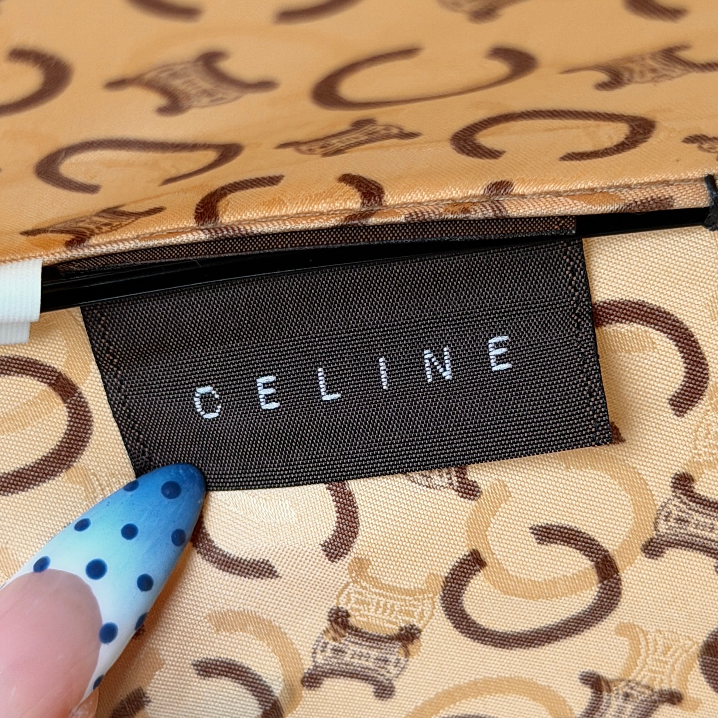 Celine Macadam Monogram Umbrella in brown and beige with classic curved handle and signature all-over logo pattern.