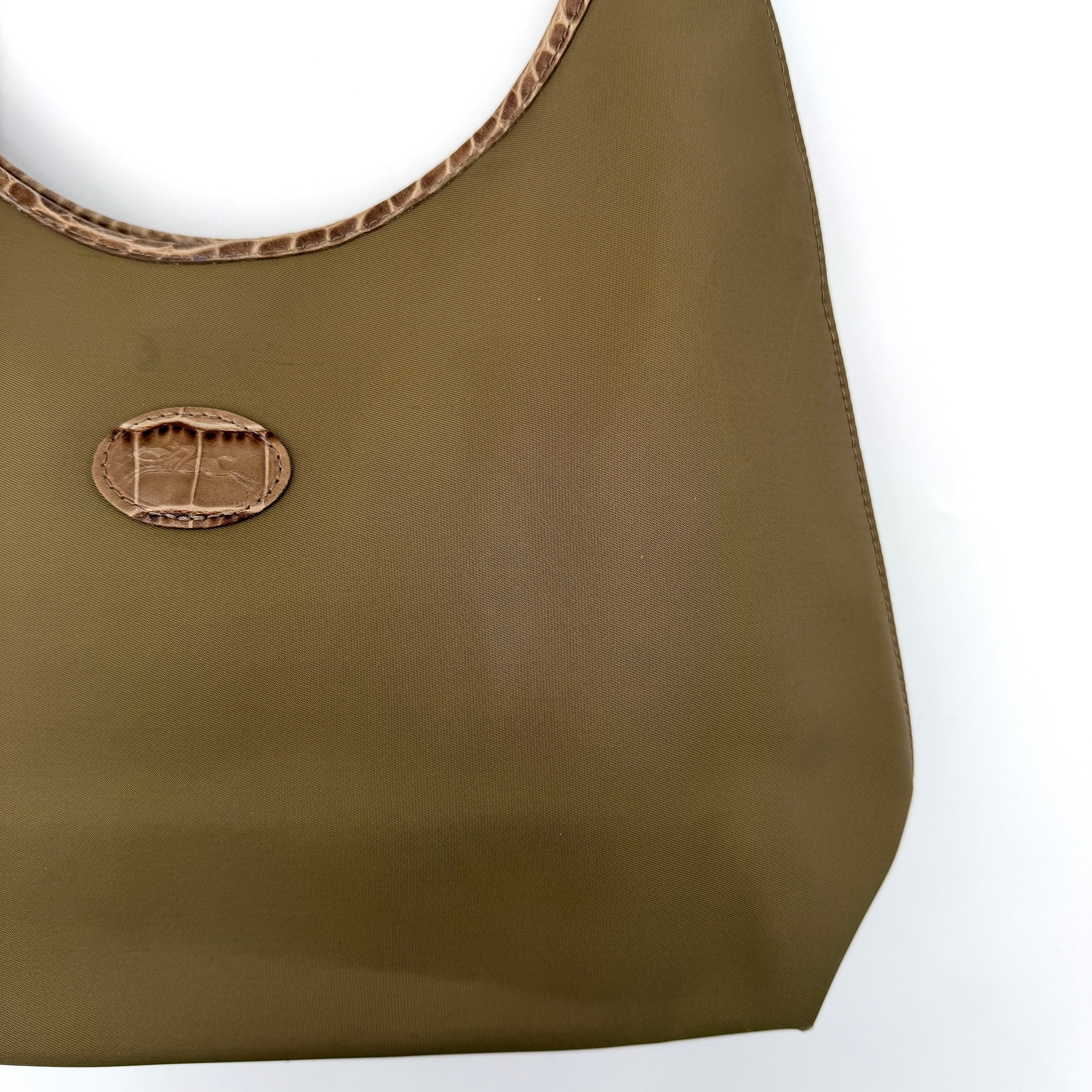 Longchamp Sac Porte Epaule hobo shoulder bag in brown nylon with lizard-embossed leather trim and a wide single handle.