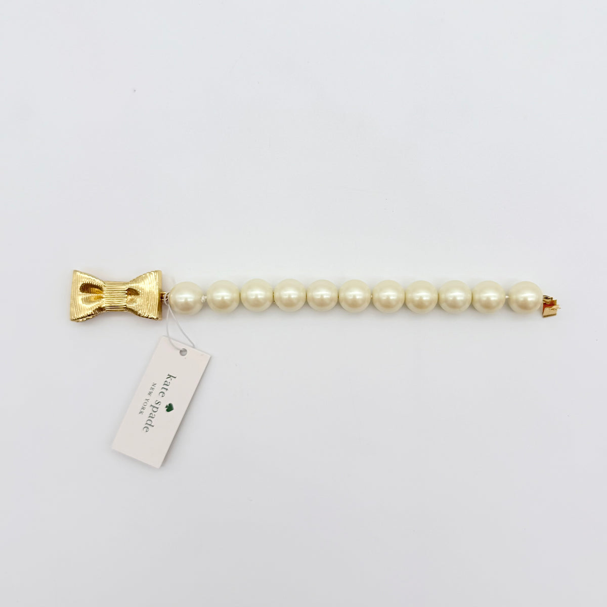 Kate Spade All Wrapped Up Pearl Gold Bow Bracelet