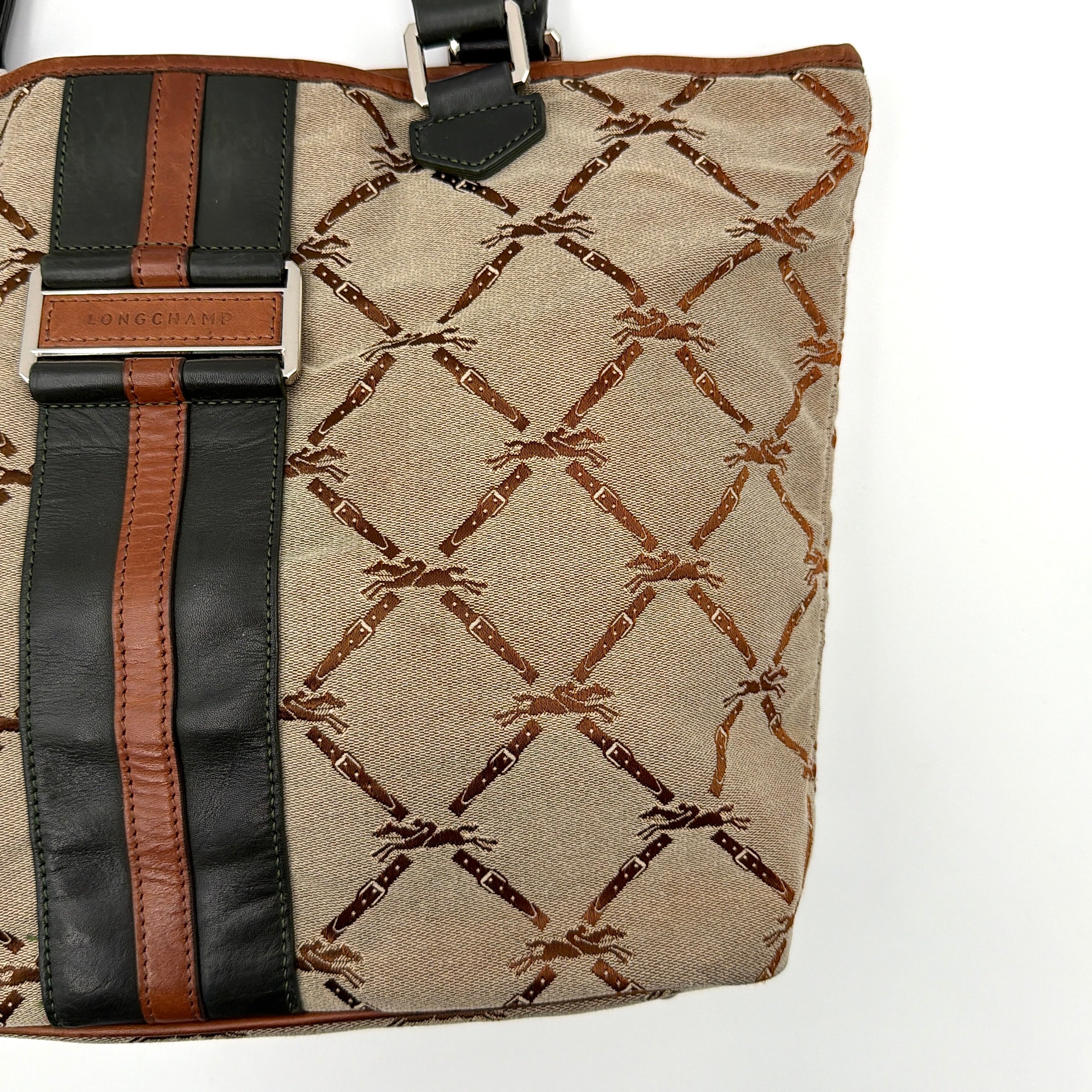 Longchamp beige jacquard tote bag with brown and black leather centre stripe and structured leather handles.