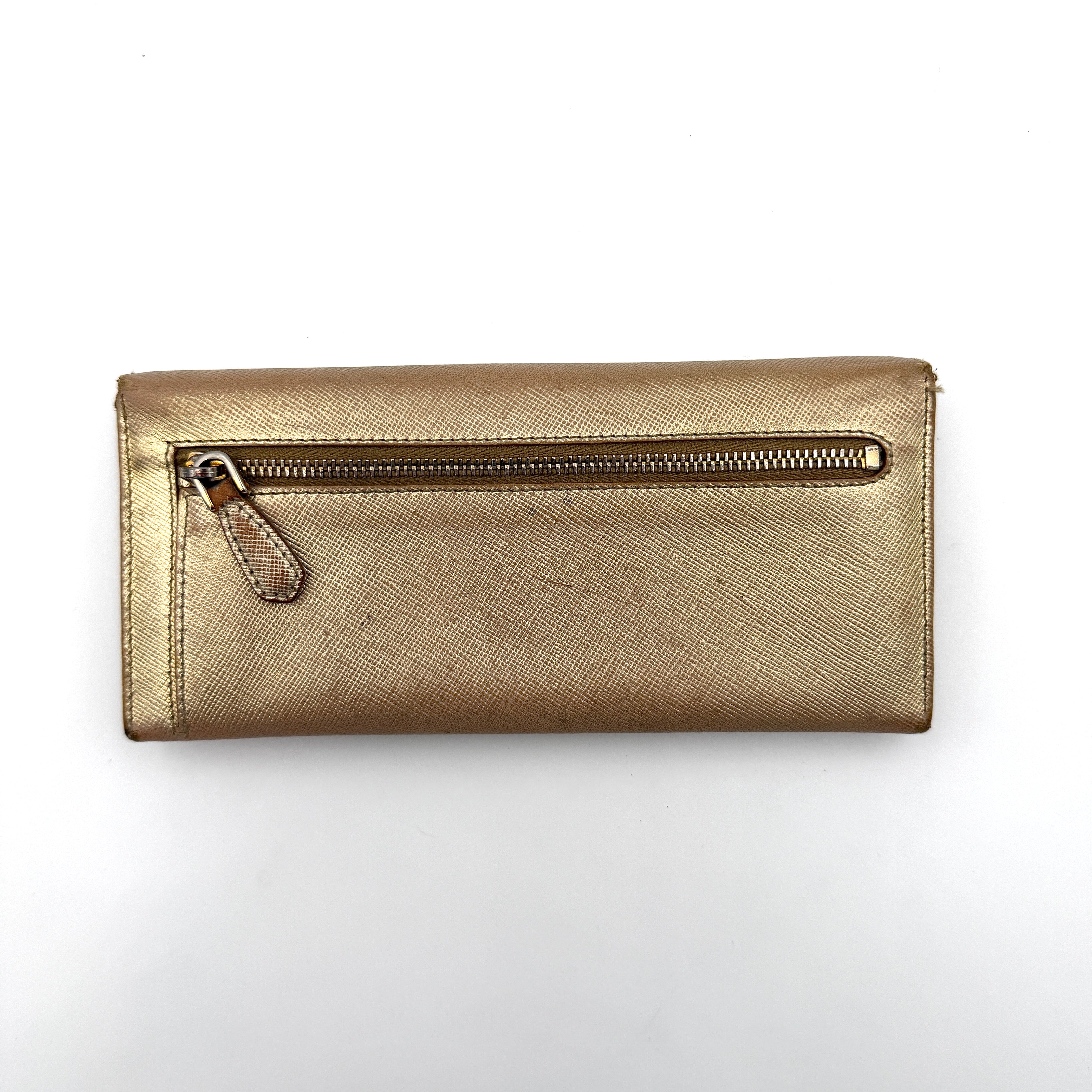 Prada Saffiano Continental Long Wallet in metallic gold Saffiano leather with gold-tone logo and structured silhouette.