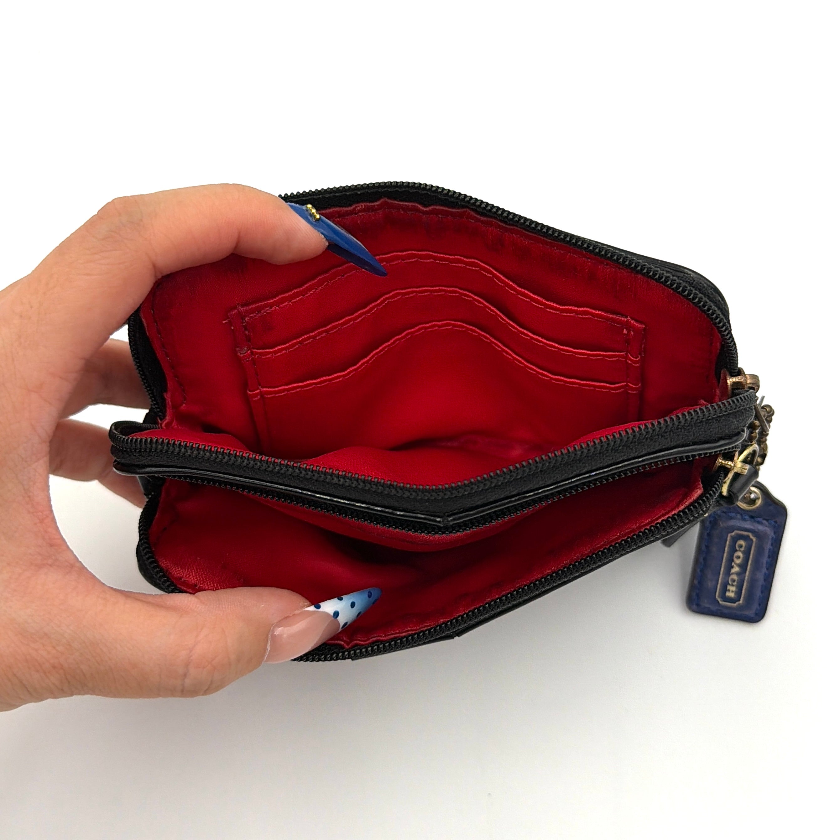 Coach Poppy Tartan Plaid Pouch in multicolour jacquard with bold red and navy check and blue hang tags.