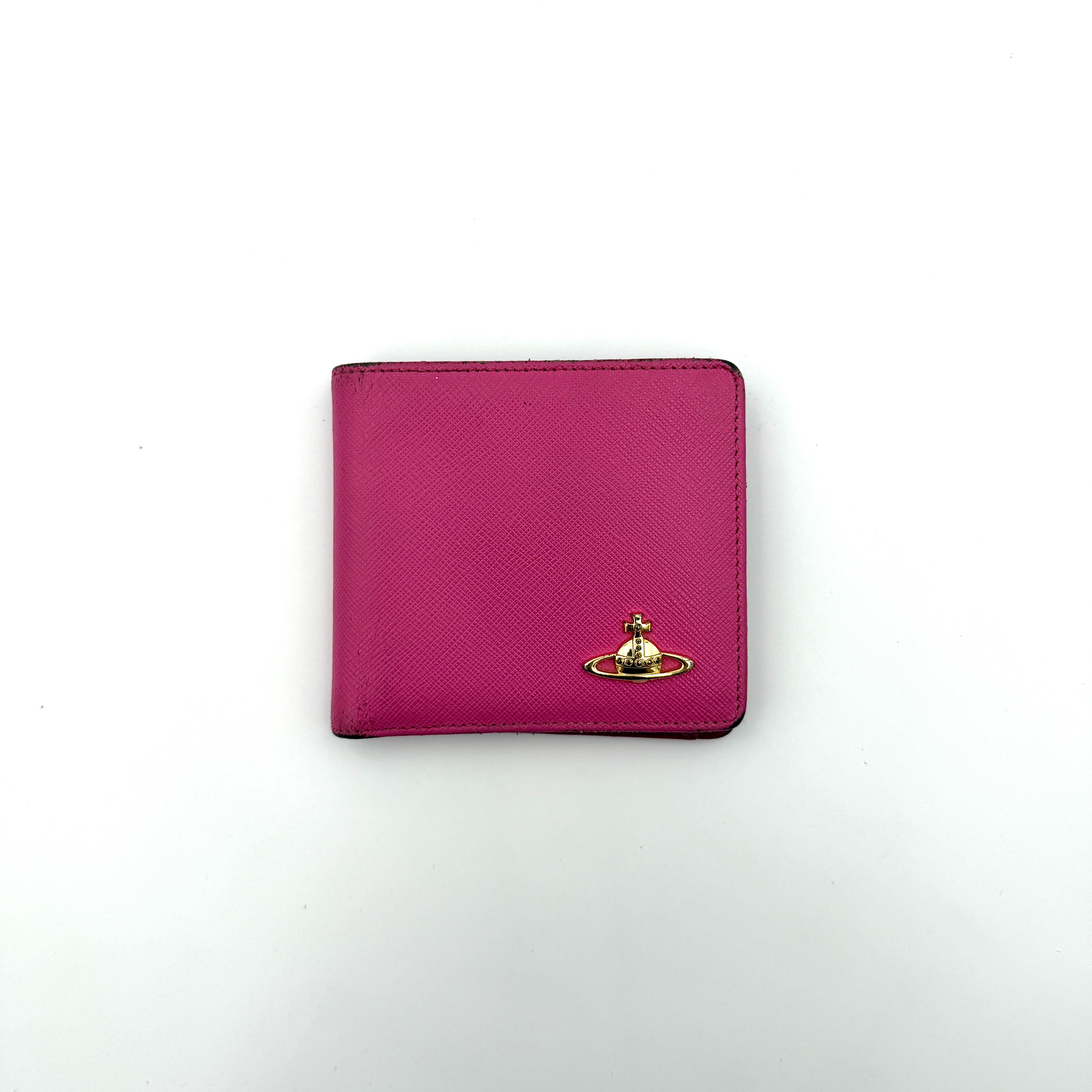 Vivienne Westwood Orb Saffiano Wallet in brilliant pink with gold-tone Orb emblem and cross-grained leather texture.