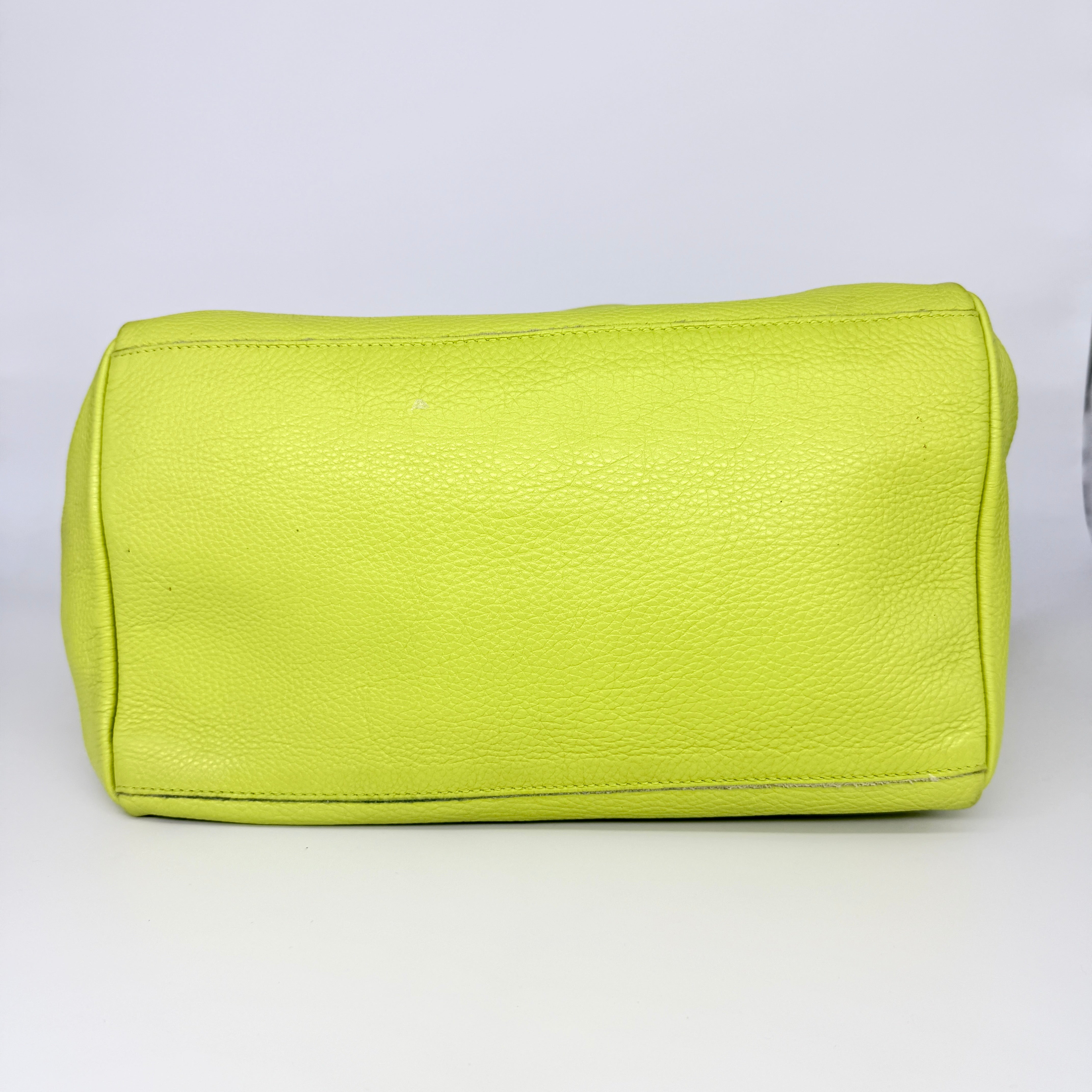 Furla Shopper Tote in neon yellow and beige grained leather with black handles and gold-tone hardware.