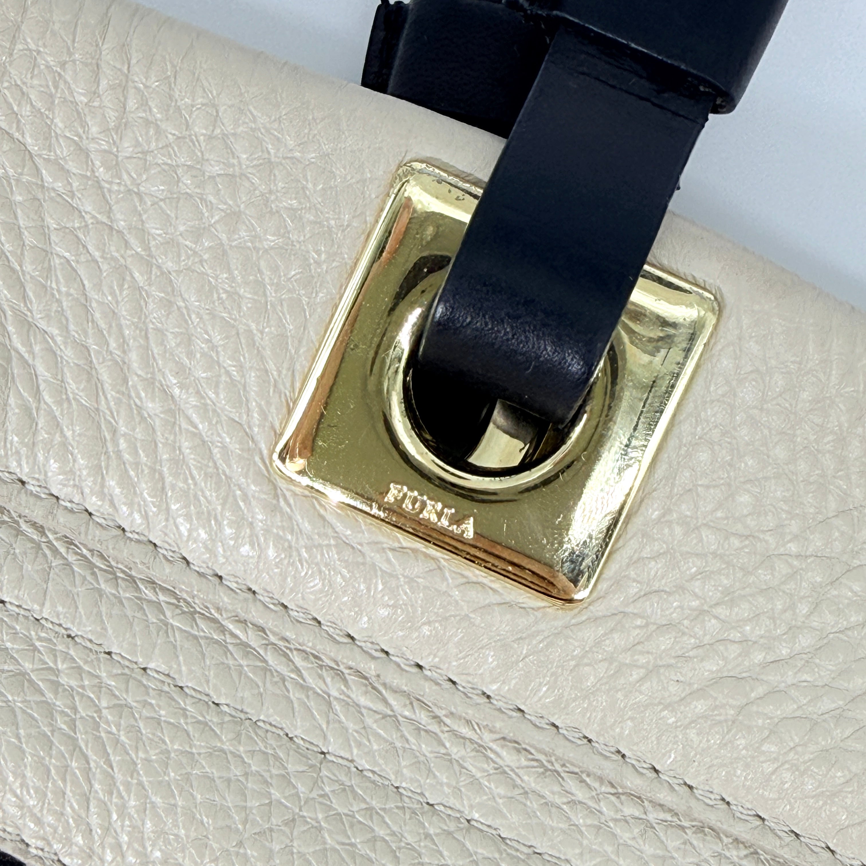 Furla Shopper Tote in neon yellow and beige grained leather with black handles and gold-tone hardware.