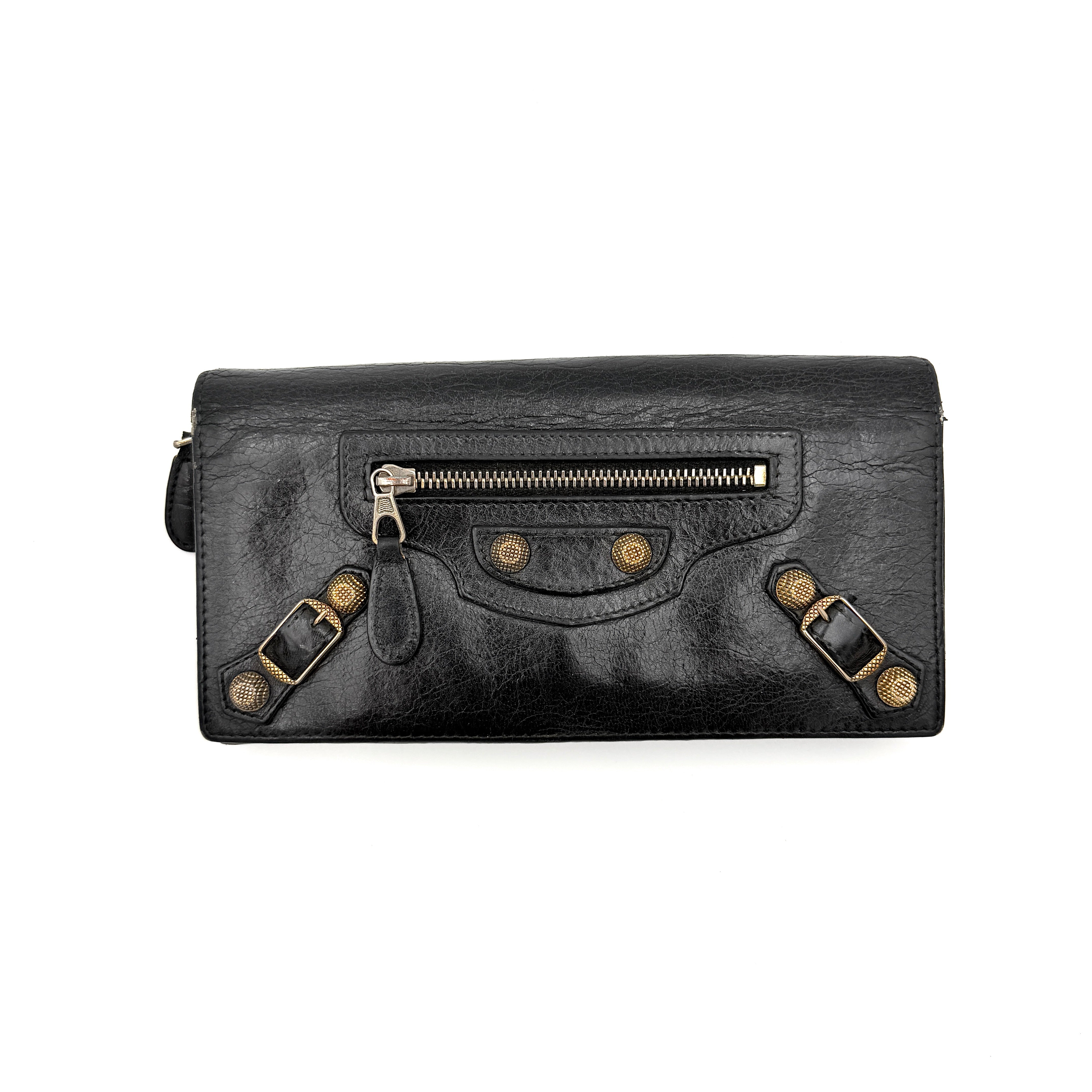 Balenciaga Motorcycle Studded Long Wallet in black distressed leather with signature brass studs and buckle details.