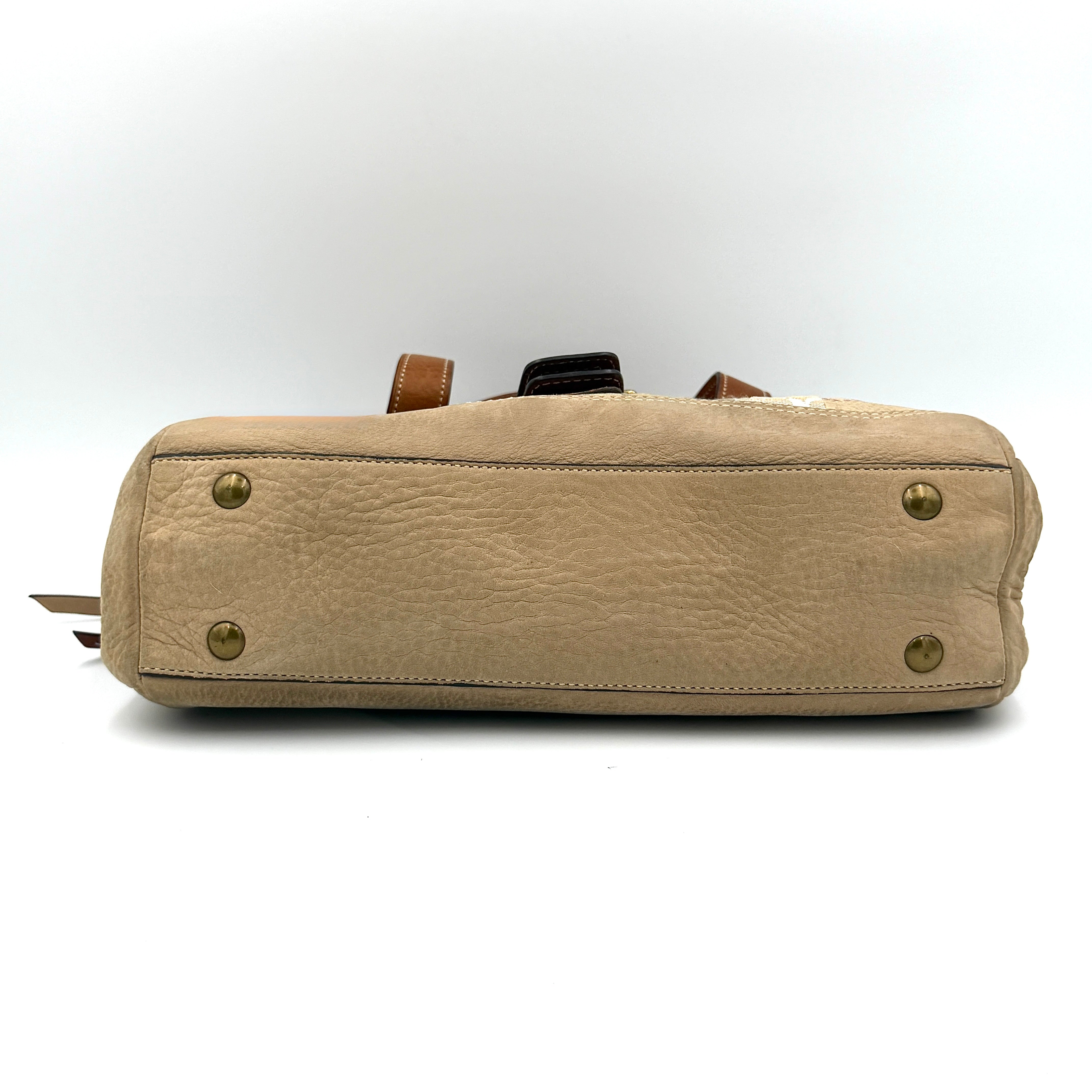 Coach Y2K Soho Patchwork shoulder bag in brown, gold and beige tones with mixed textile panels, caramel leather trim and brass hardware.