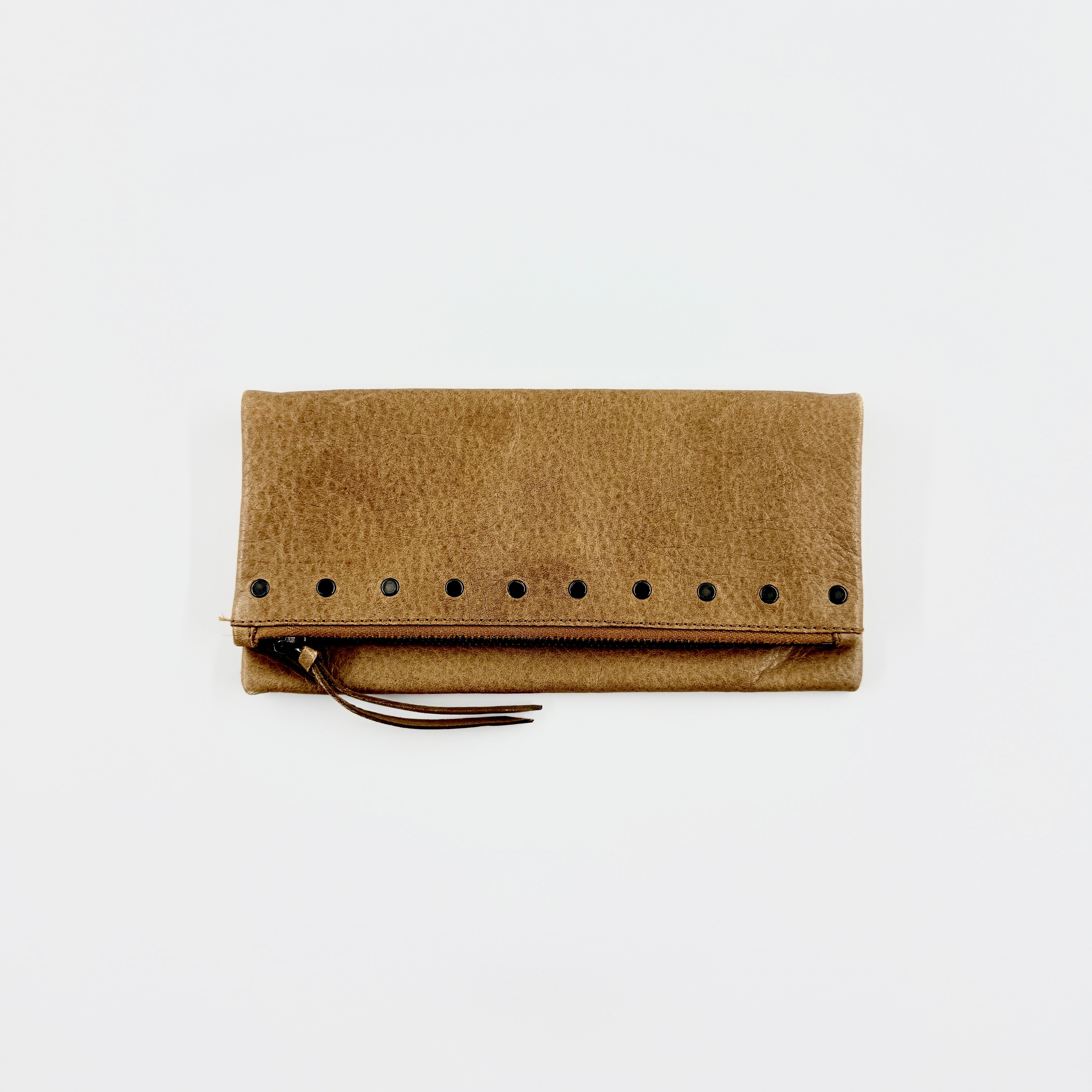 Miu Miu brown textured leather foldover pouch with matte black studs, zip closure, and slim silhouette.